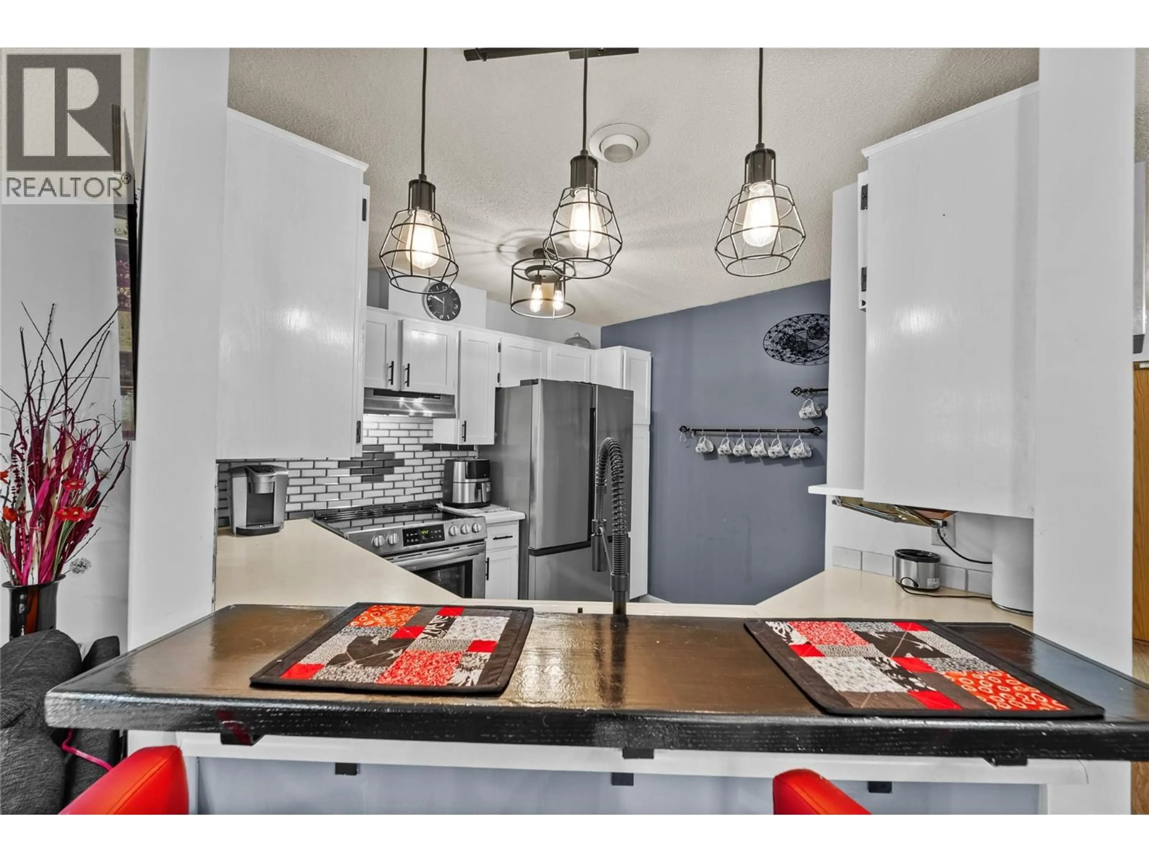 Open concept kitchen, ceramic/tile floor for 108 - 338 NICOLA STREET, Kamloops British Columbia V2C2P5