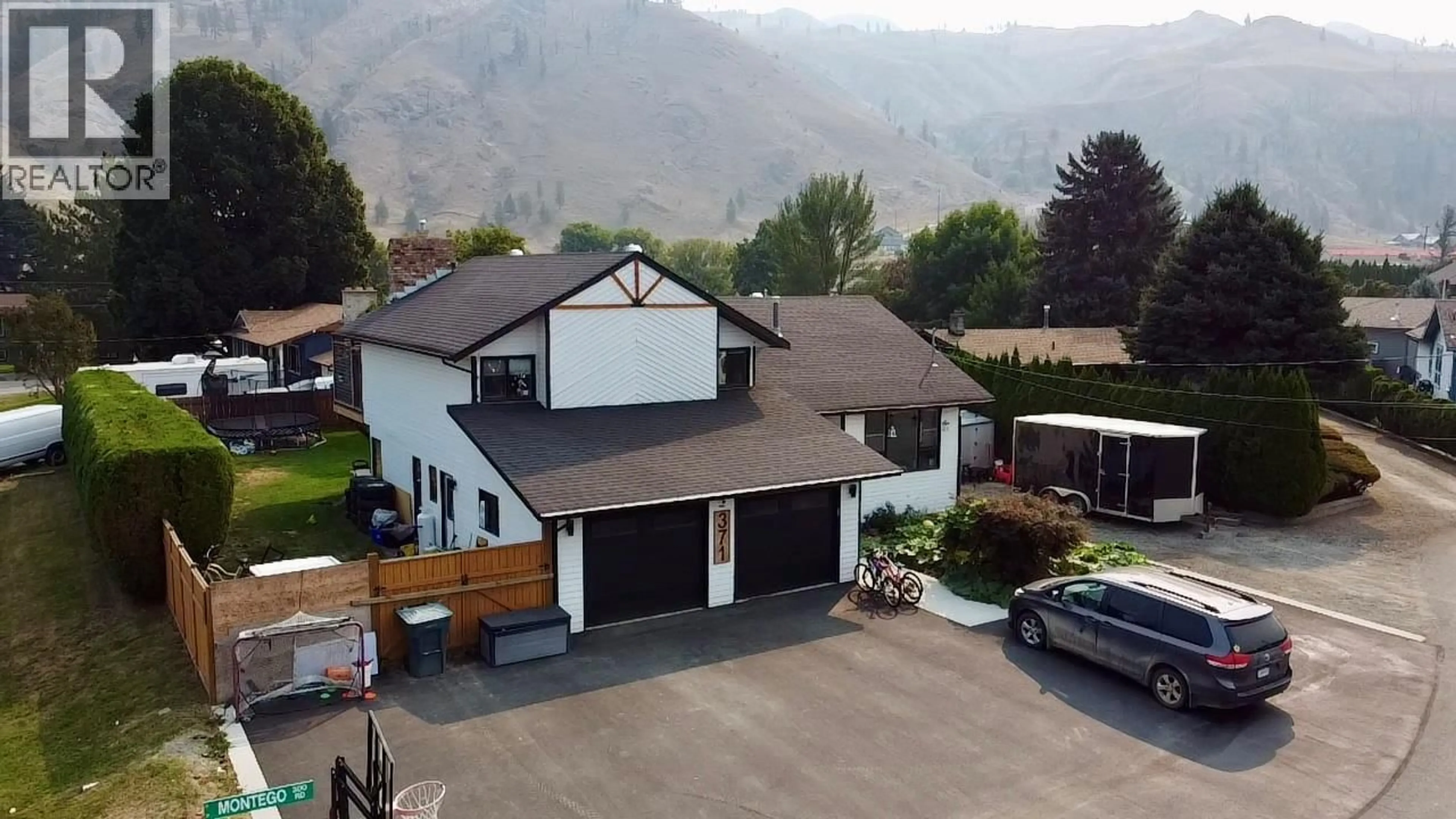 A pic from outside/outdoor area/front of a property/back of a property/a pic from drone, mountain view for 371 MONTEGO ROAD, Kamloops British Columbia V2H1N1