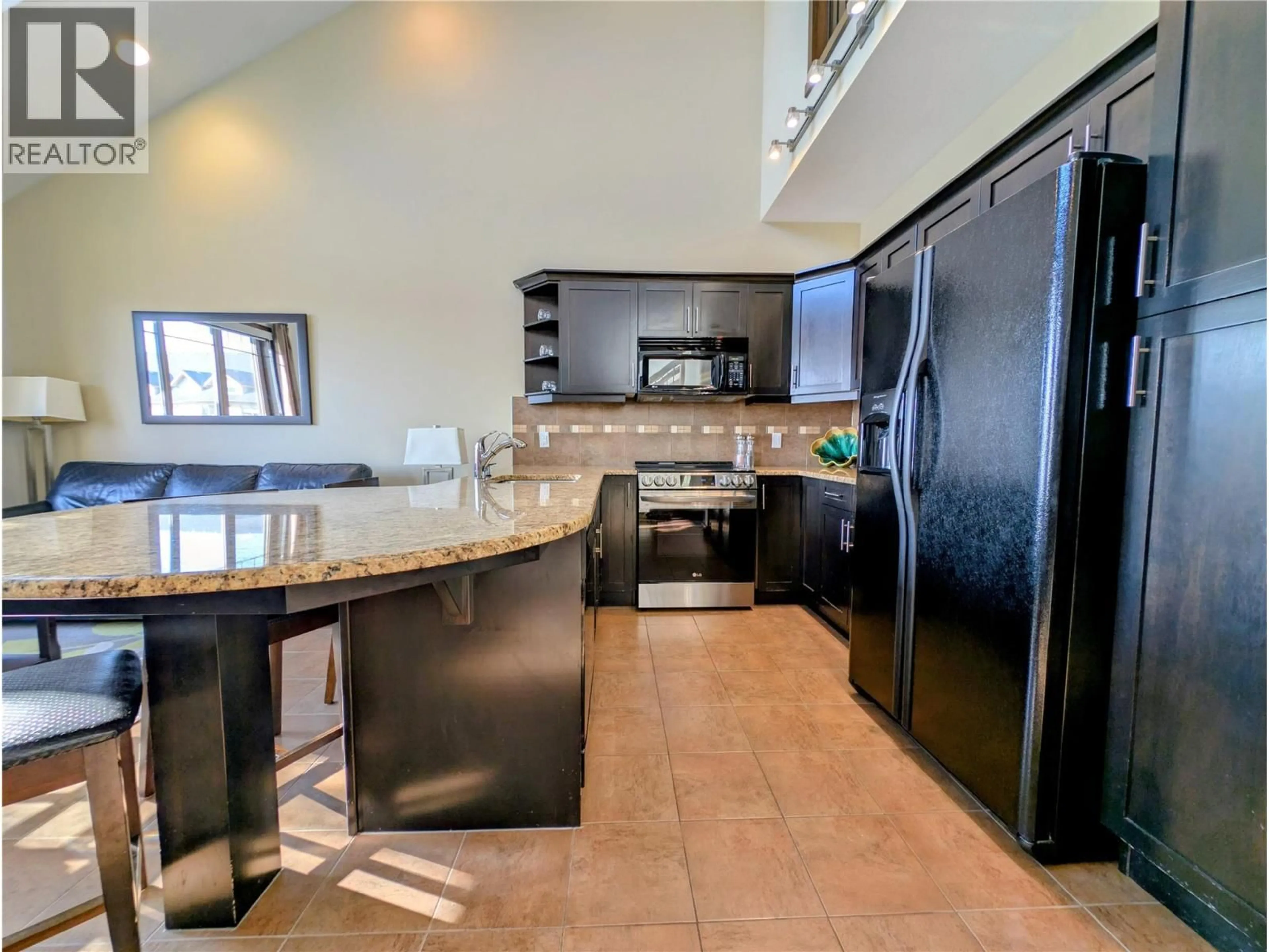 Open concept kitchen, ceramic/tile floor for 835B - 800 BIGHORN BOULEVARD, Radium Hot Springs British Columbia V0A1M0