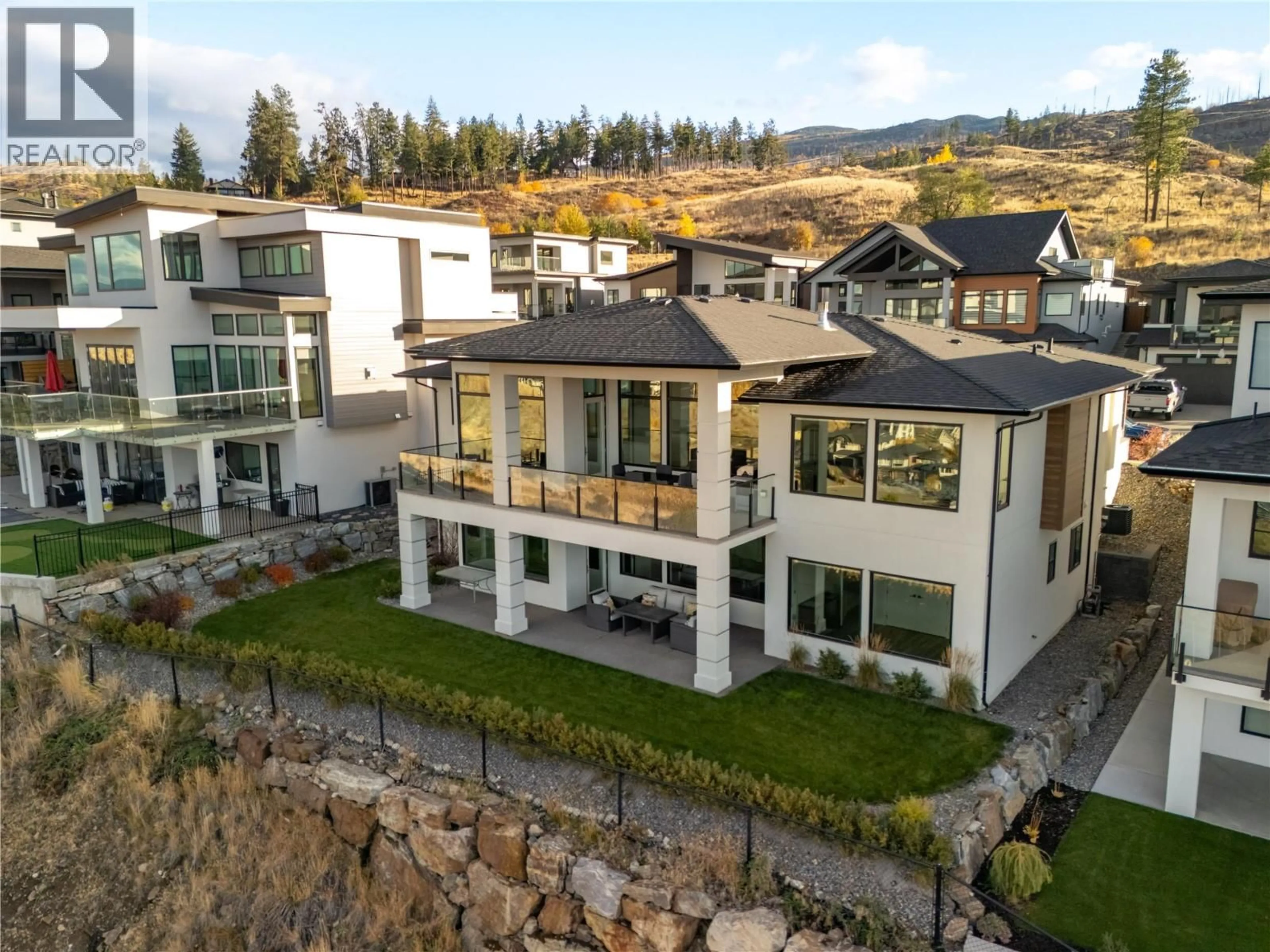 A pic from outside/outdoor area/front of a property/back of a property/a pic from drone, mountain view for 442 REDTAIL COURT, Kelowna British Columbia V1W0B1