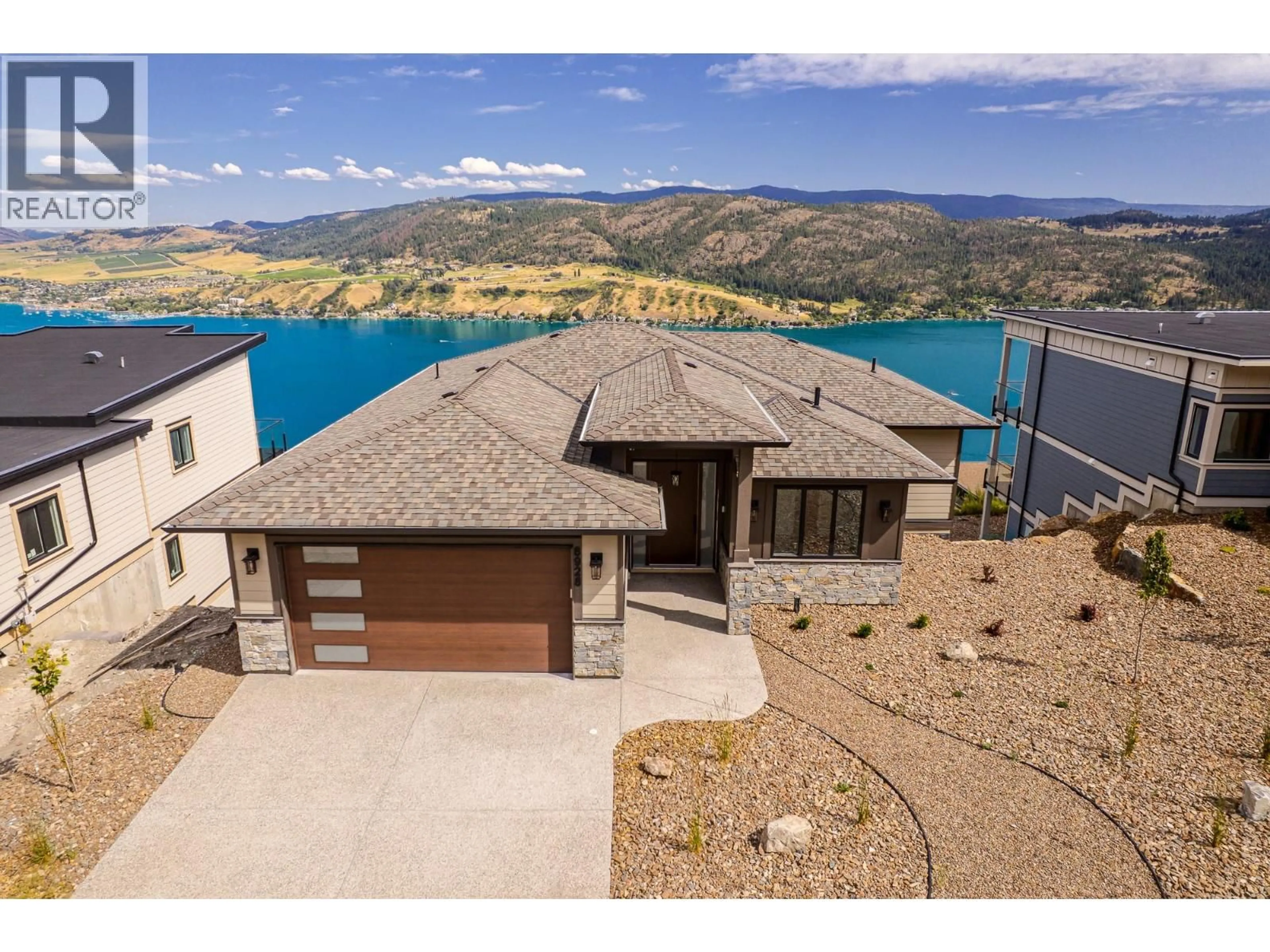 A pic from outside/outdoor area/front of a property/back of a property/a pic from drone, water/lake/river/ocean view for 8928 TAVISTOCK ROAD, Vernon British Columbia V1H2L4