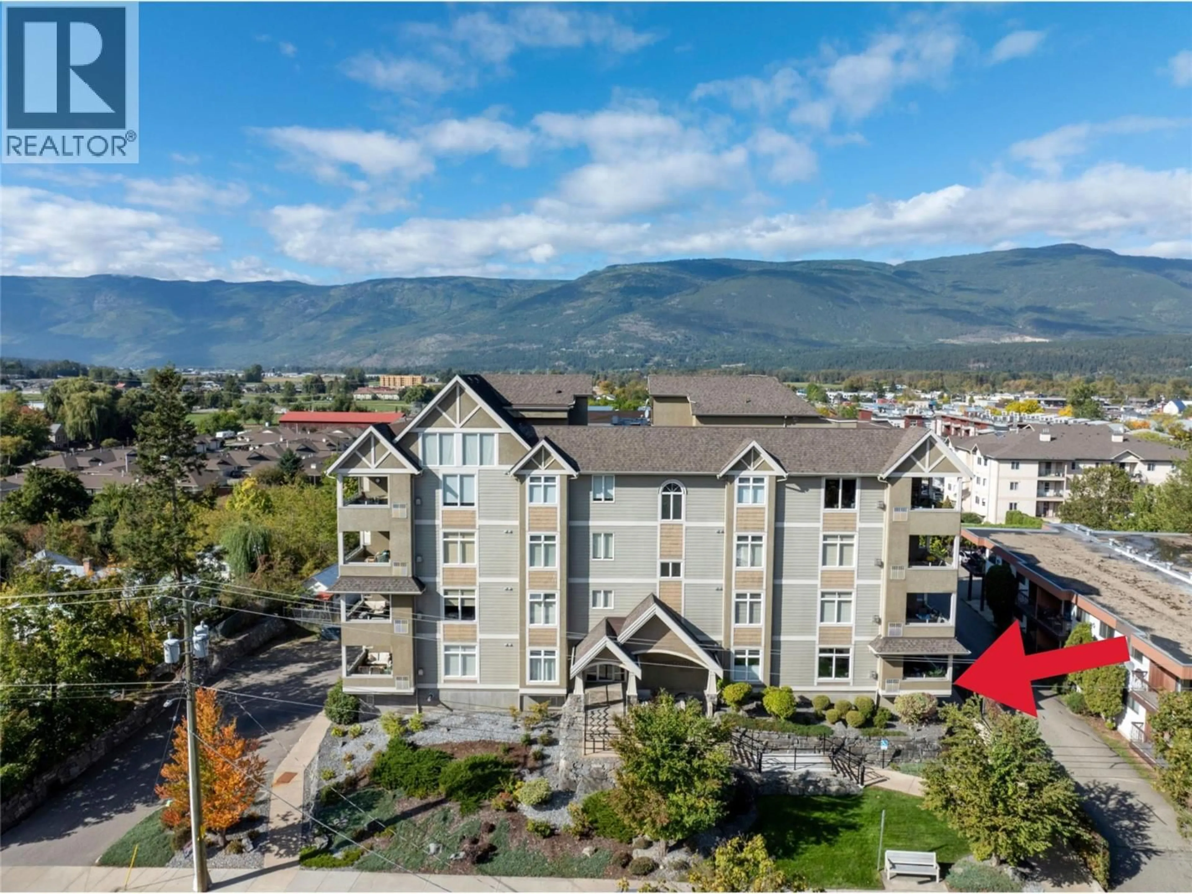 A pic from outside/outdoor area/front of a property/back of a property/a pic from drone, mountain view for 102 - 611 SHUSWAP STREET SOUTHWEST, Salmon Arm British Columbia V1E0A9