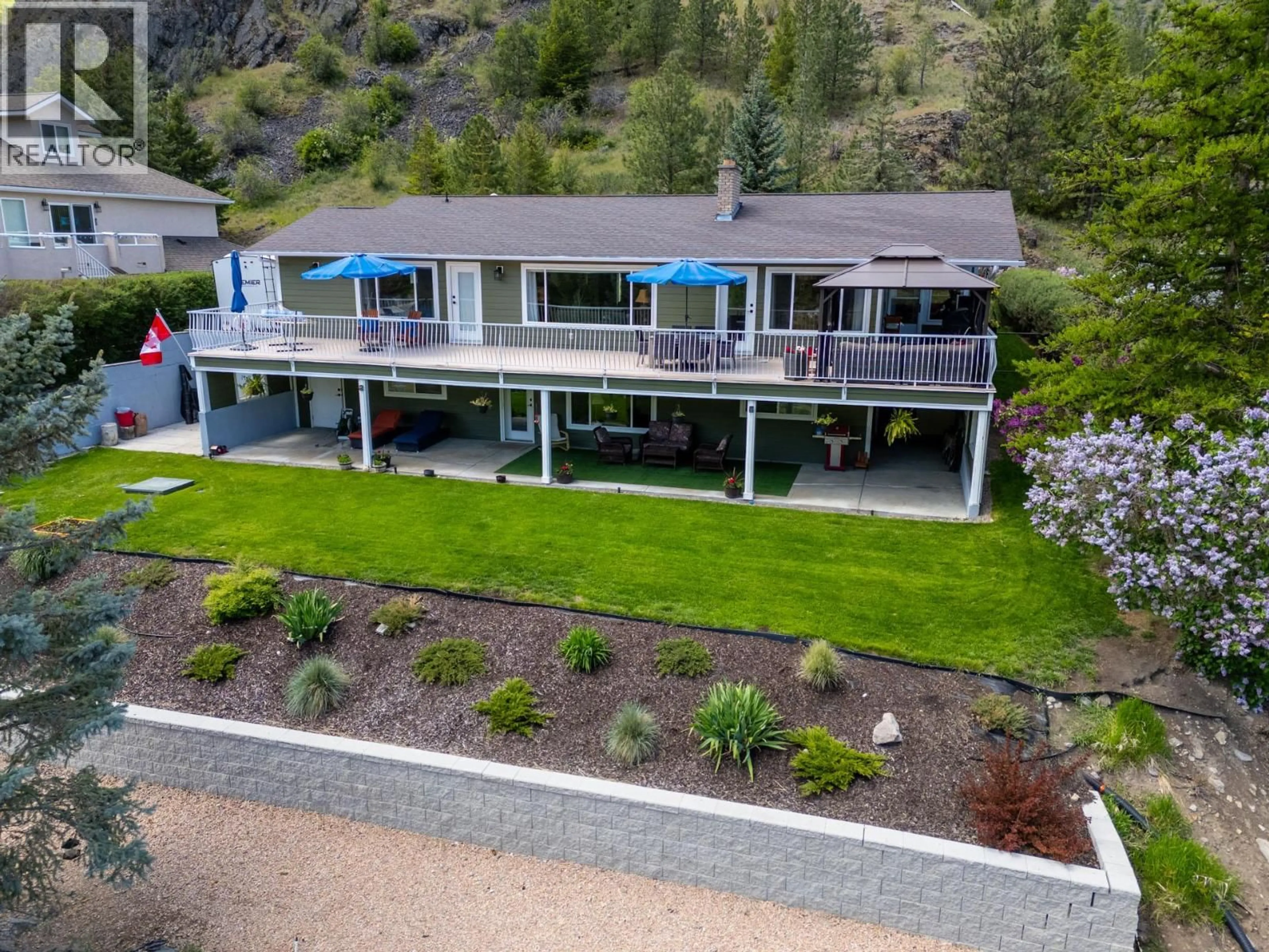 A pic from outside/outdoor area/front of a property/back of a property/a pic from drone, water/lake/river/ocean view for 119 ST ANDREWS DRIVE, Kaleden British Columbia V0H1K0