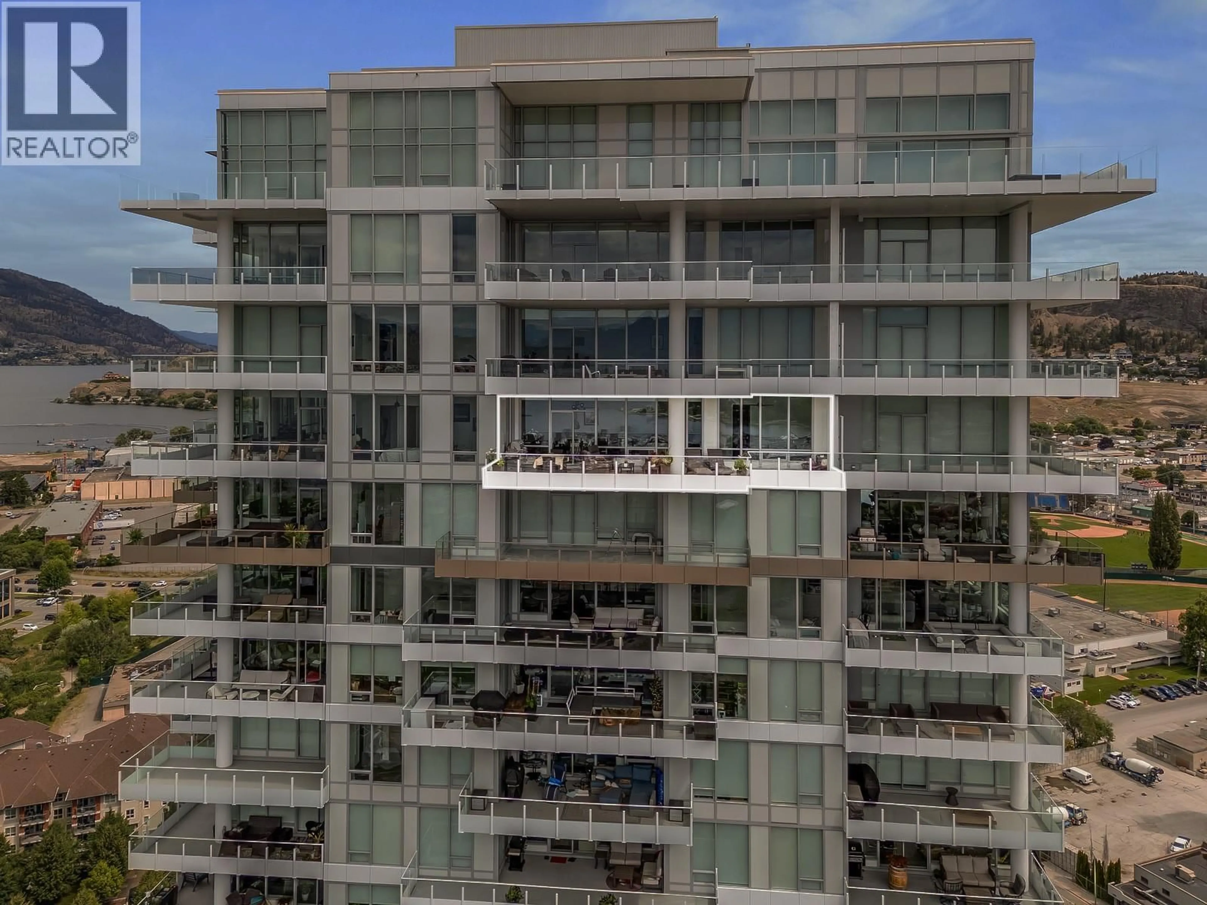 A pic from outside/outdoor area/front of a property/back of a property/a pic from drone, city buildings view from balcony for 2602 - 1181 SUNSET DRIVE, Kelowna British Columbia V1Y0L4