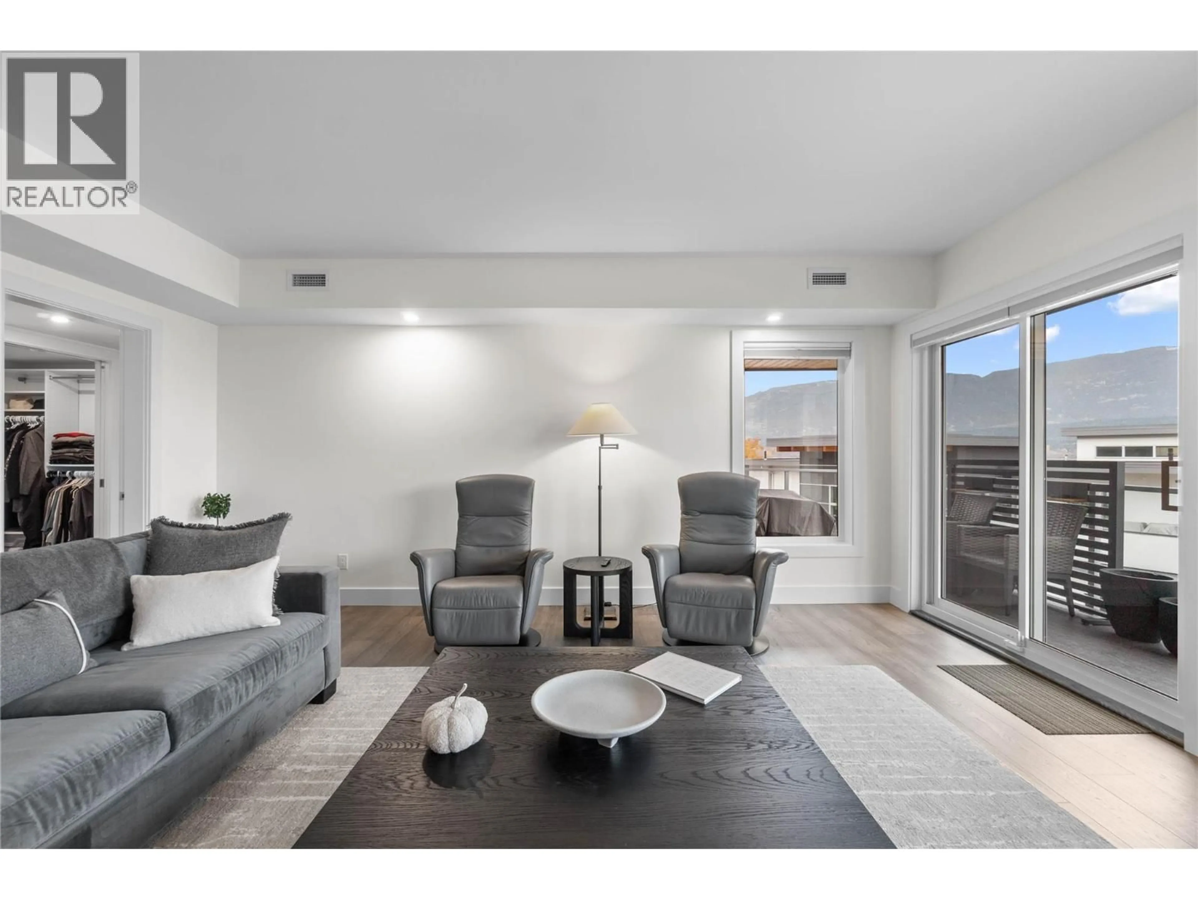 Living room with furniture, unknown for 302 - 131 HARBOURFRONT DRIVE NORTHEAST, Salmon Arm British Columbia V1E0G4