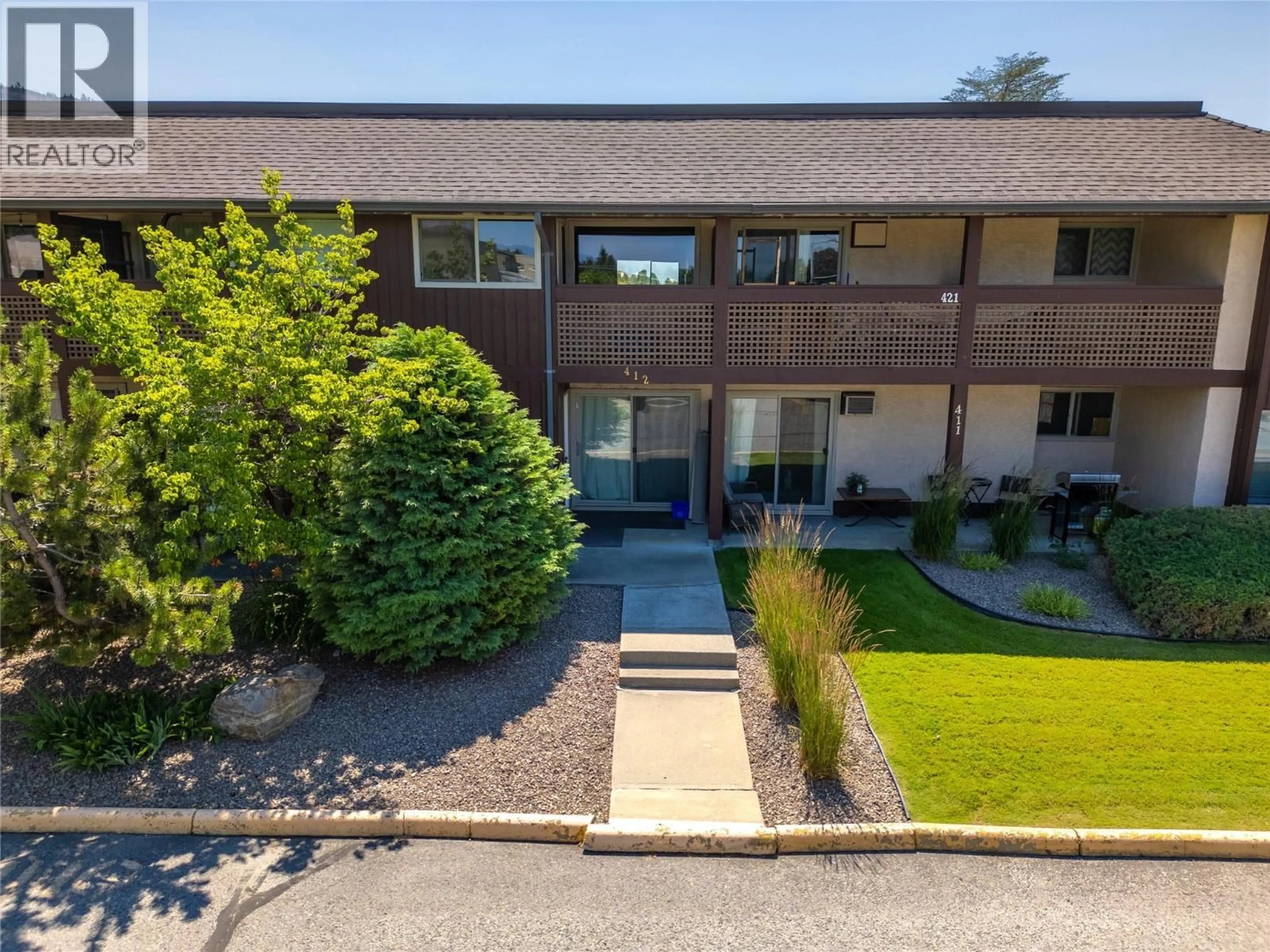 A pic from outside/outdoor area/front of a property/back of a property/a pic from drone, unknown for 412 - 3140 WILSON STREET, Penticton British Columbia V2A3T7