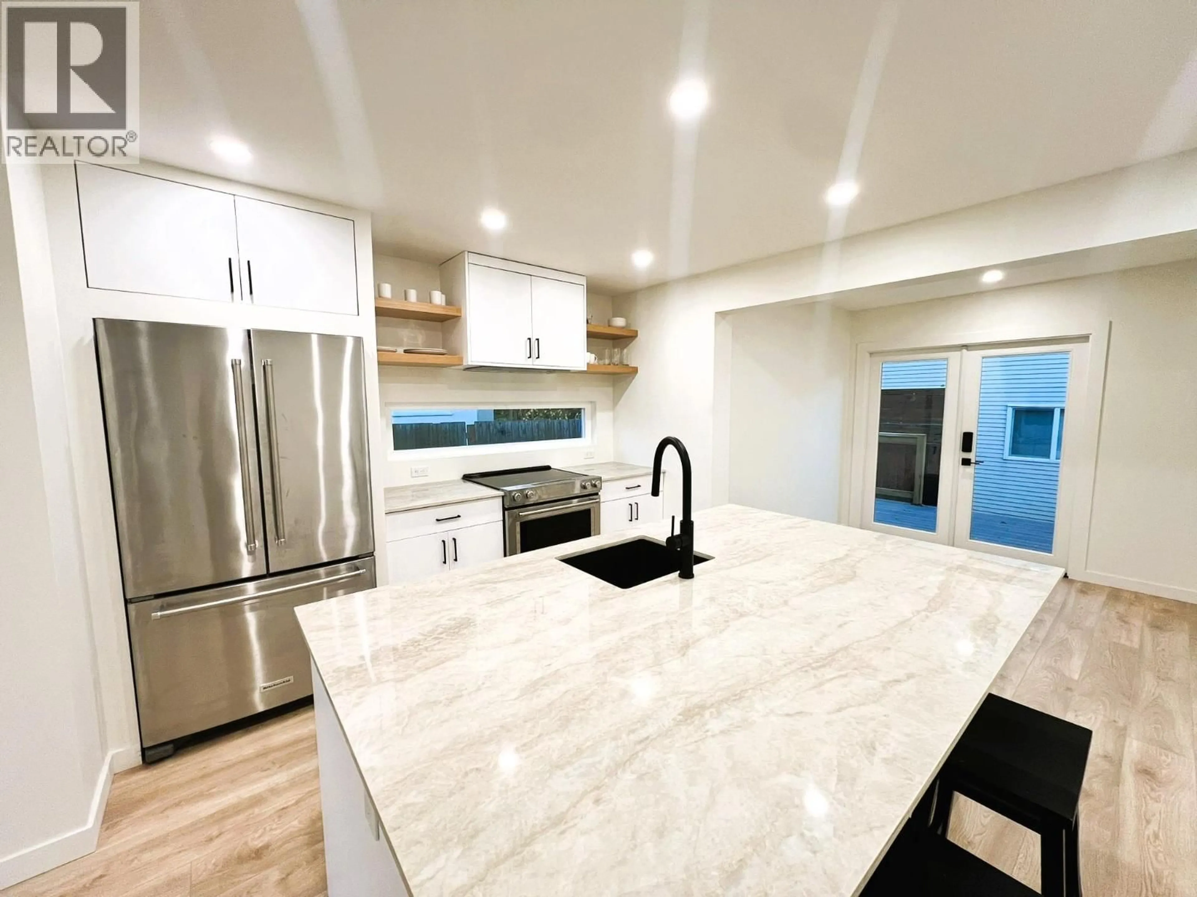 Open concept kitchen, ceramic/tile floor for 2174 RICHTER AVENUE, Kelowna British Columbia V1Y2P1