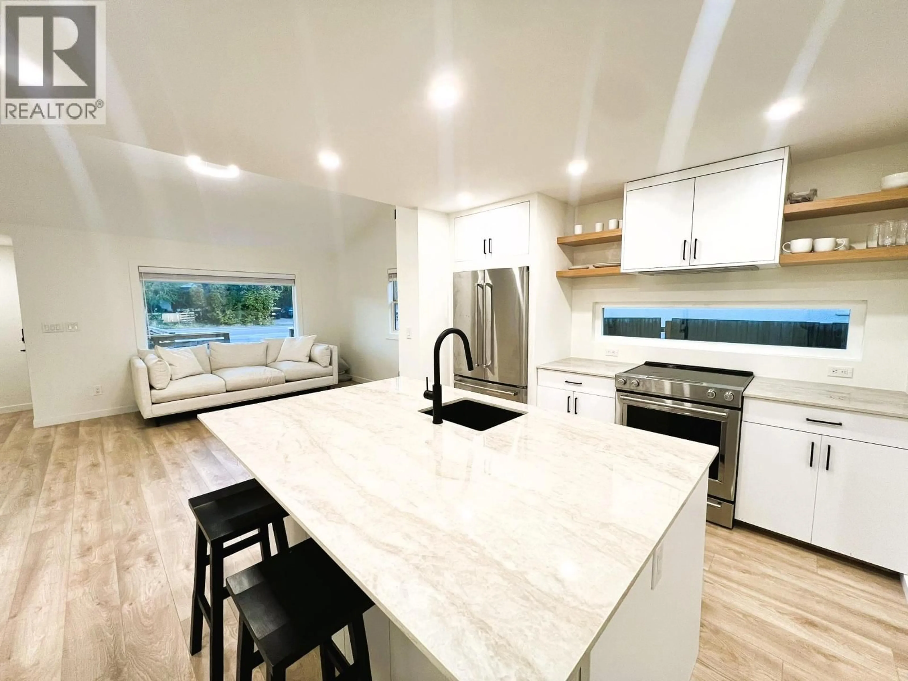 Open concept kitchen, ceramic/tile floor for 2174 RICHTER AVENUE, Kelowna British Columbia V1Y2P1