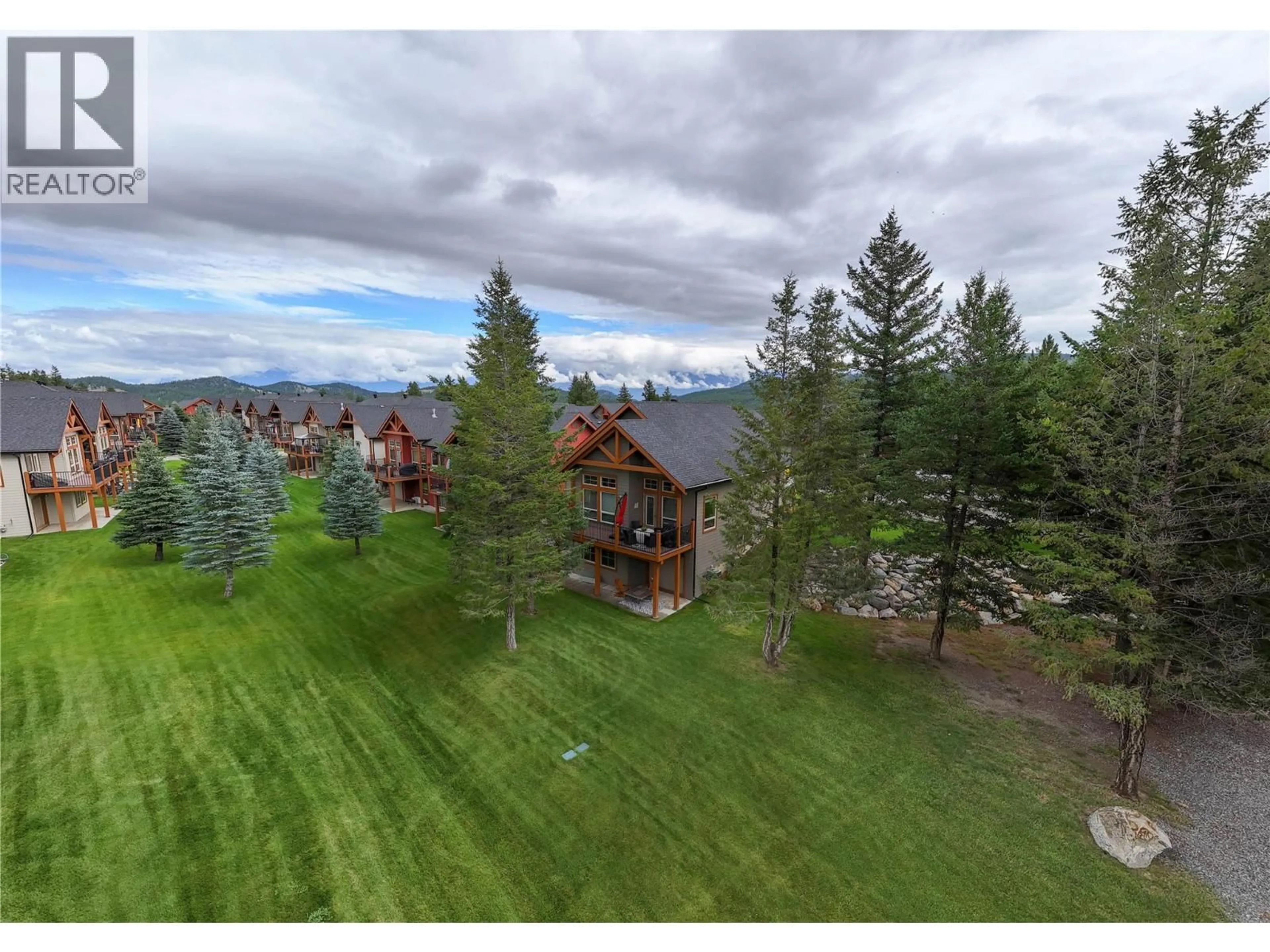 A pic from outside/outdoor area/front of a property/back of a property/a pic from drone, mountain view for 233 BOULDER  NW CREEK, Cranbrook British Columbia V1C0B4