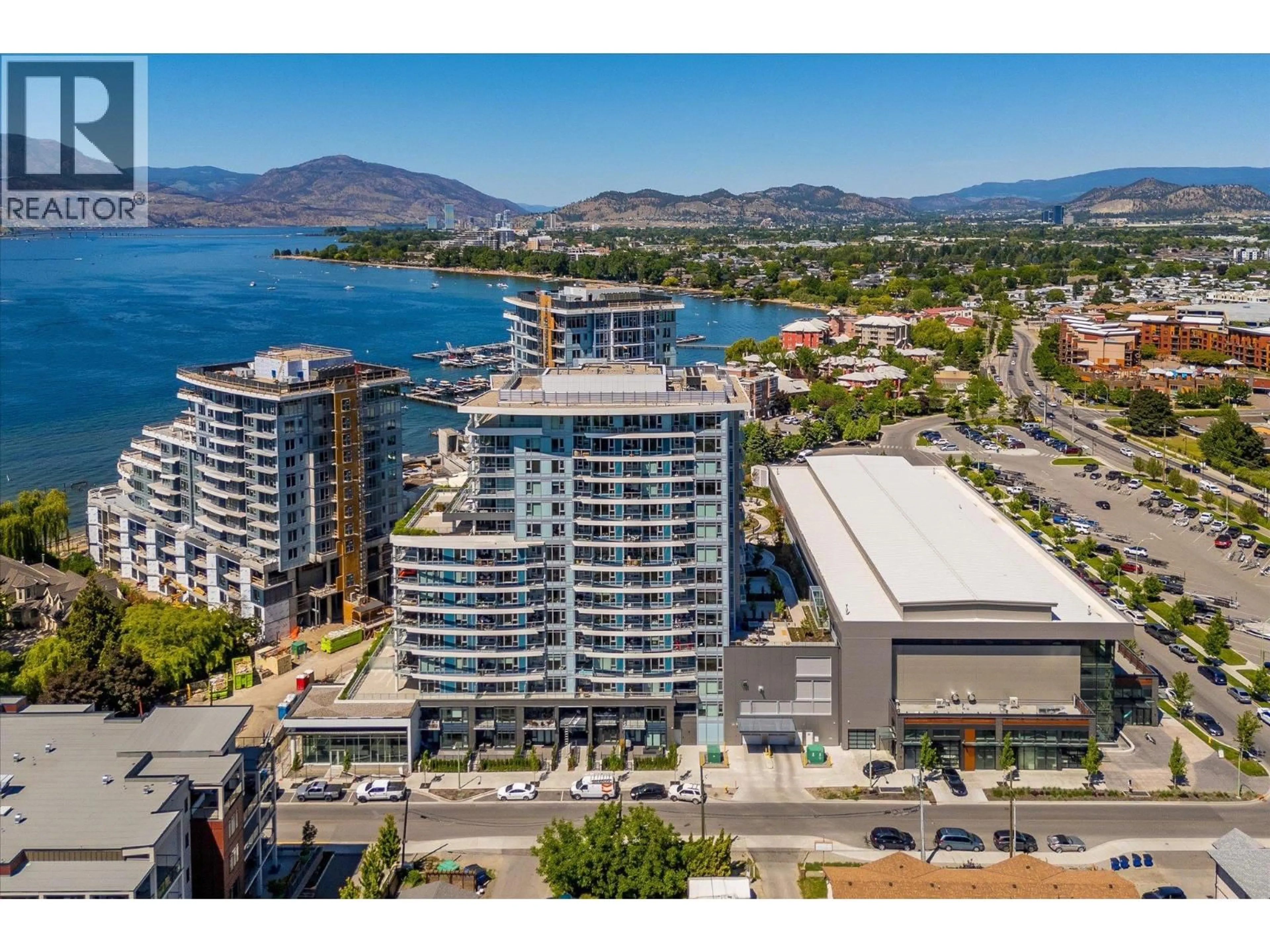 A pic from outside/outdoor area/front of a property/back of a property/a pic from drone, water/lake/river/ocean view for 508 - 3699 CAPOZZI ROAD, Kelowna British Columbia V1W0G3