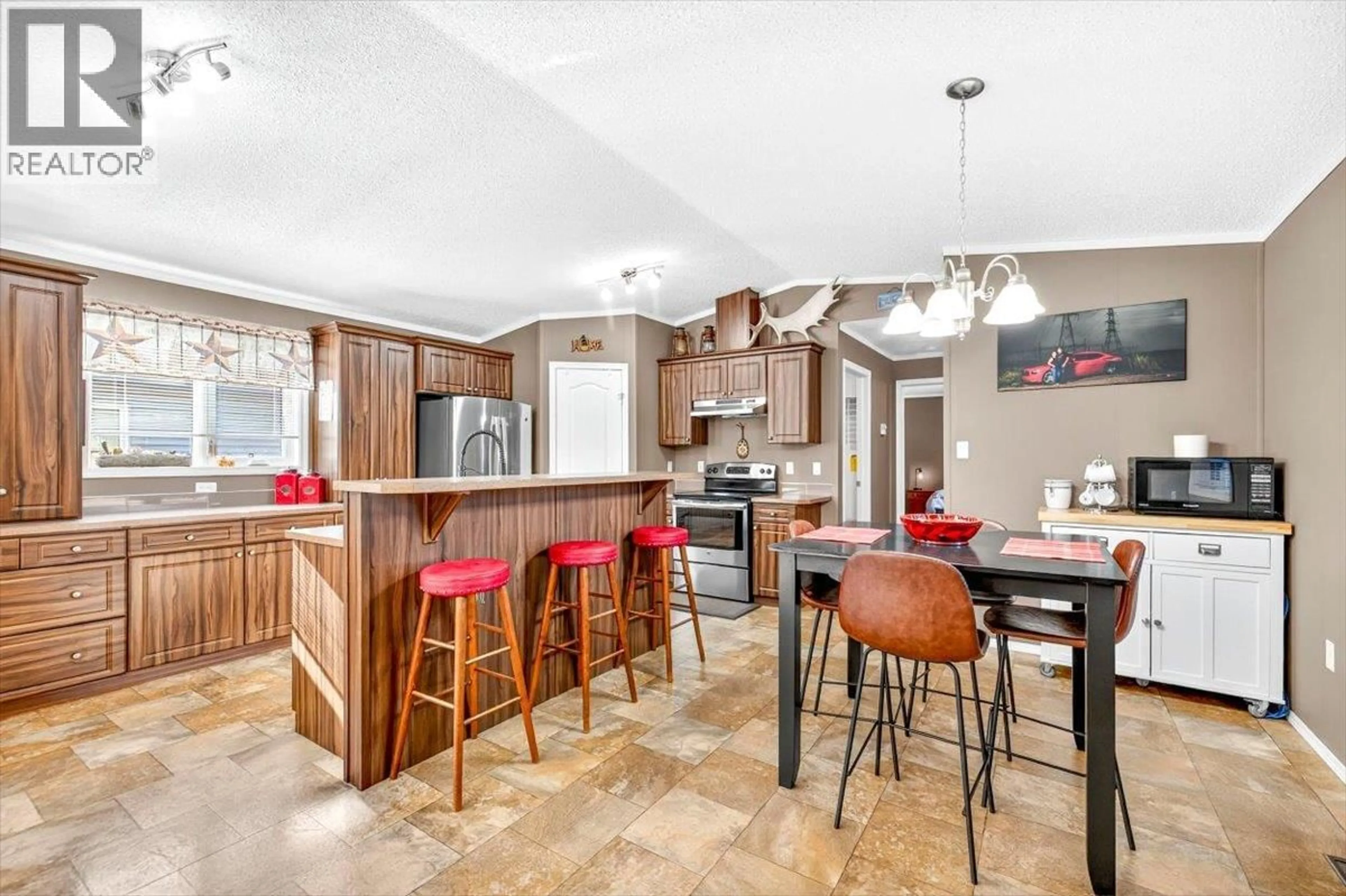 Open concept kitchen, ceramic/tile floor for 31 - 100 ASPEN DRIVE, Sparwood British Columbia V0B2G0