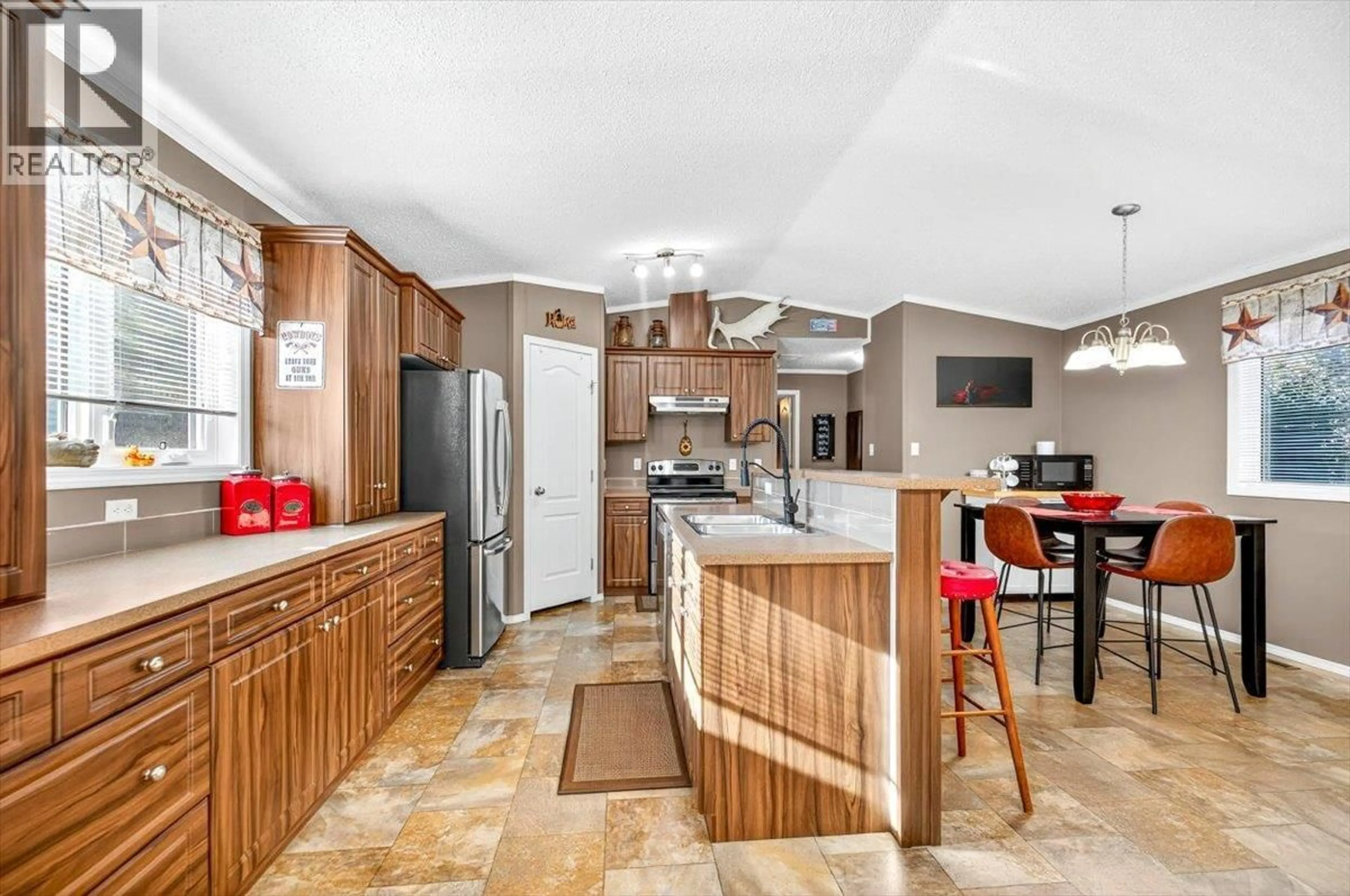 Open concept kitchen, ceramic/tile floor for 31 - 100 ASPEN DRIVE, Sparwood British Columbia V0B2G0
