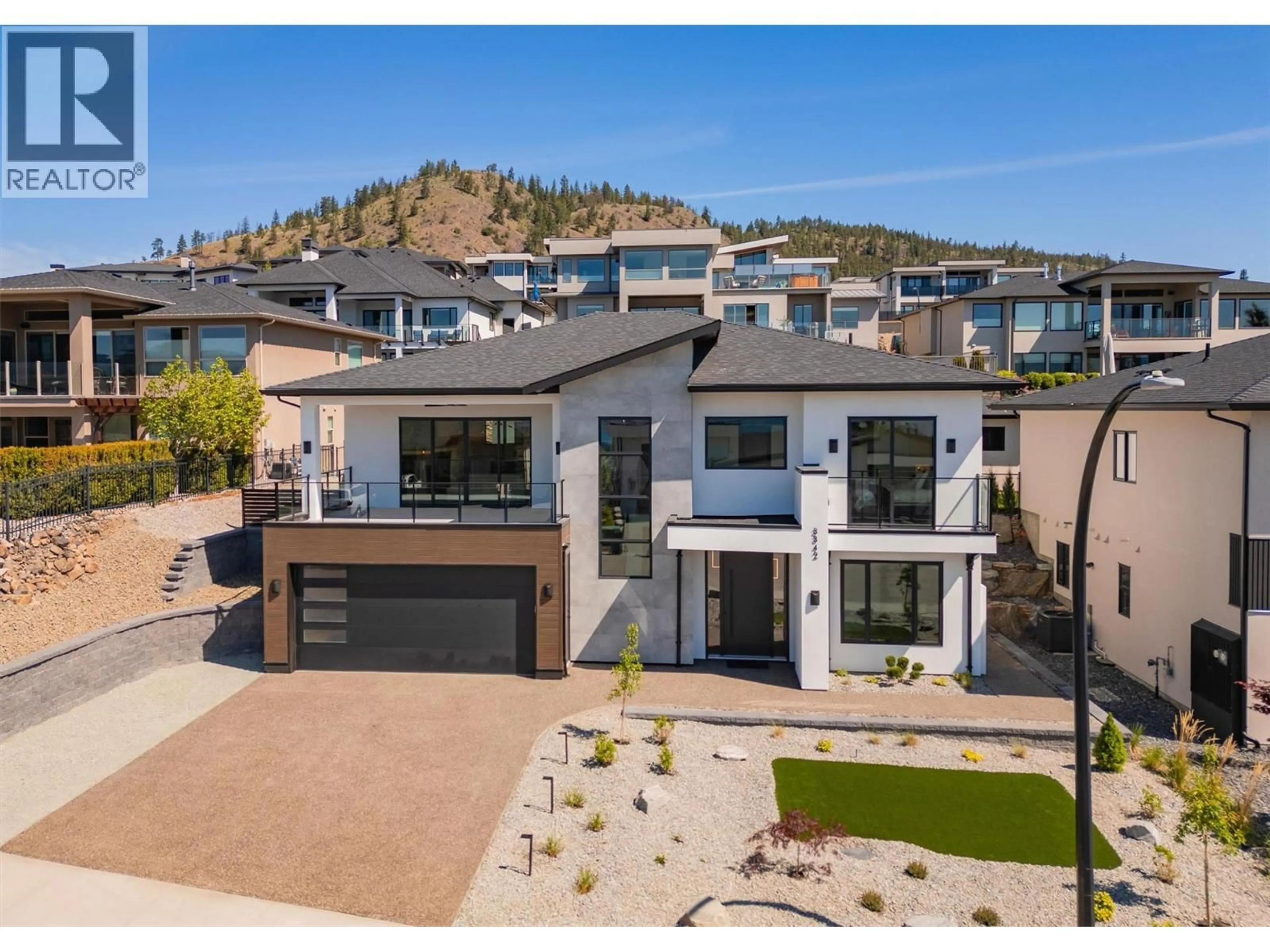 A pic from outside/outdoor area/front of a property/back of a property/a pic from drone, mountain view for 3342 VINEYARD VIEW DRIVE, West Kelowna British Columbia V4T3B4