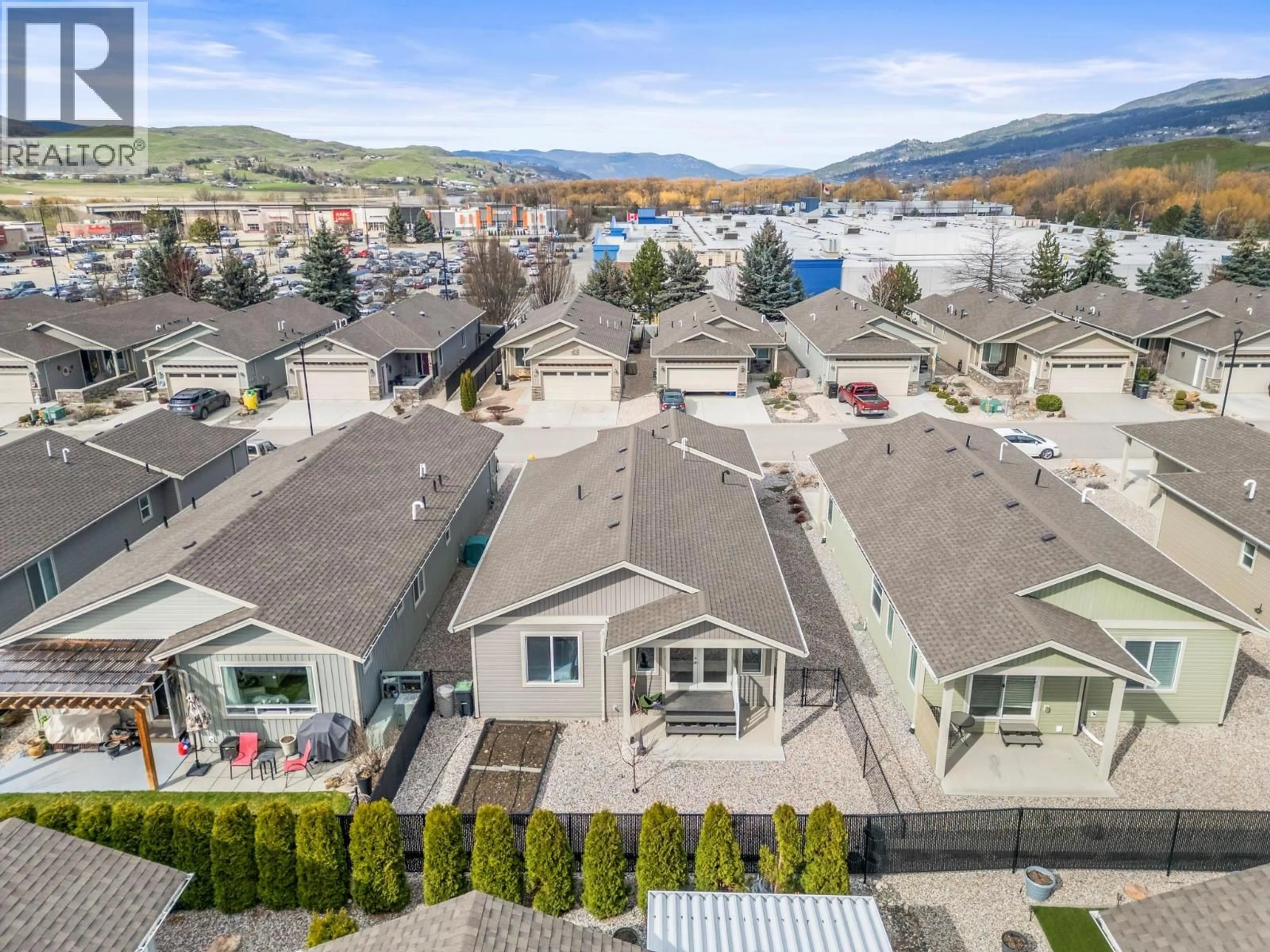 A pic from outside/outdoor area/front of a property/back of a property/a pic from drone, mountain view for 55 - 2100 55 AVENUE, Vernon British Columbia V1T9Y6