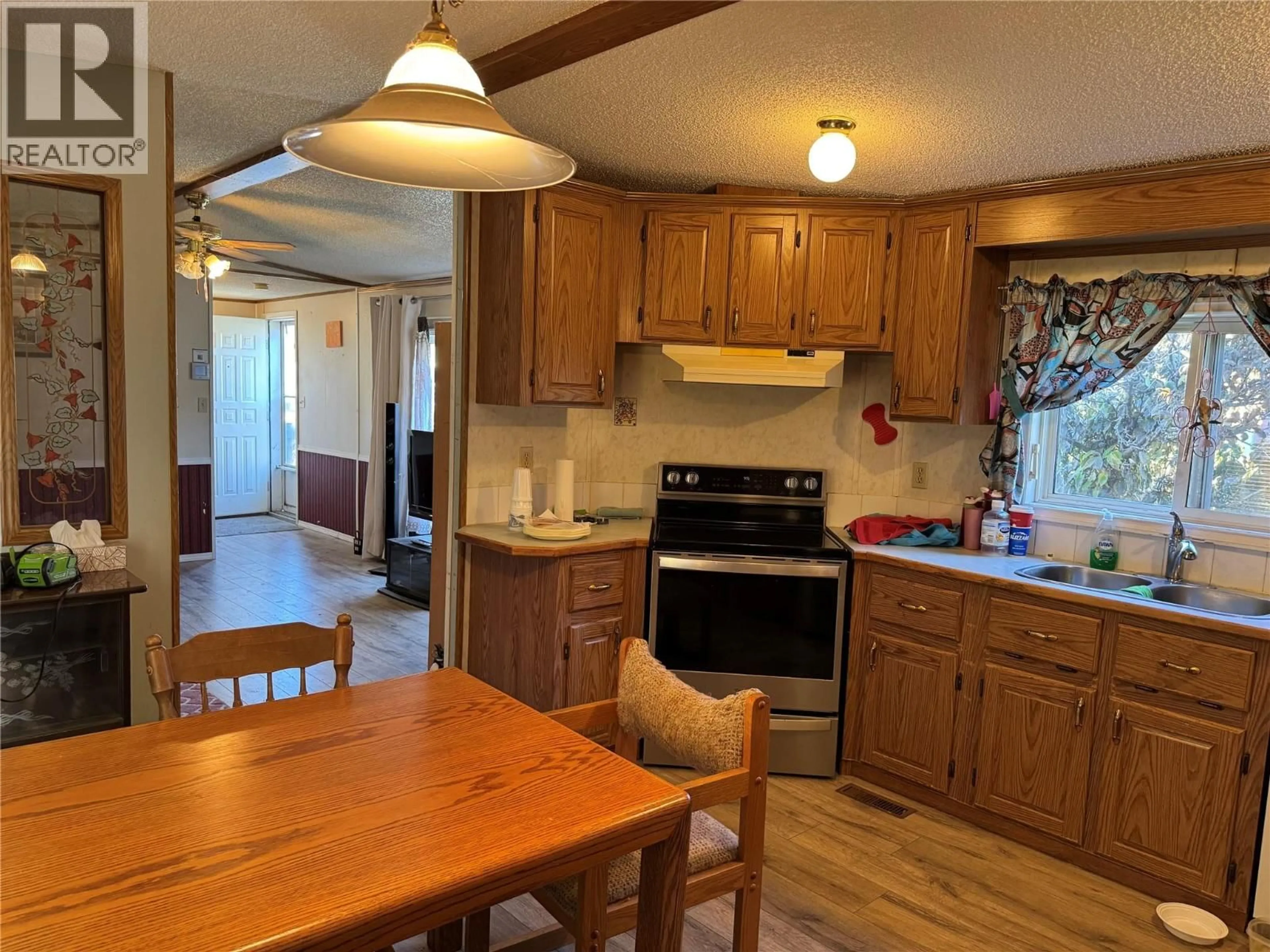 Standard kitchen, wood/laminate floor for A14 - 220 G & M ROAD, Kamloops British Columbia V2H1A4