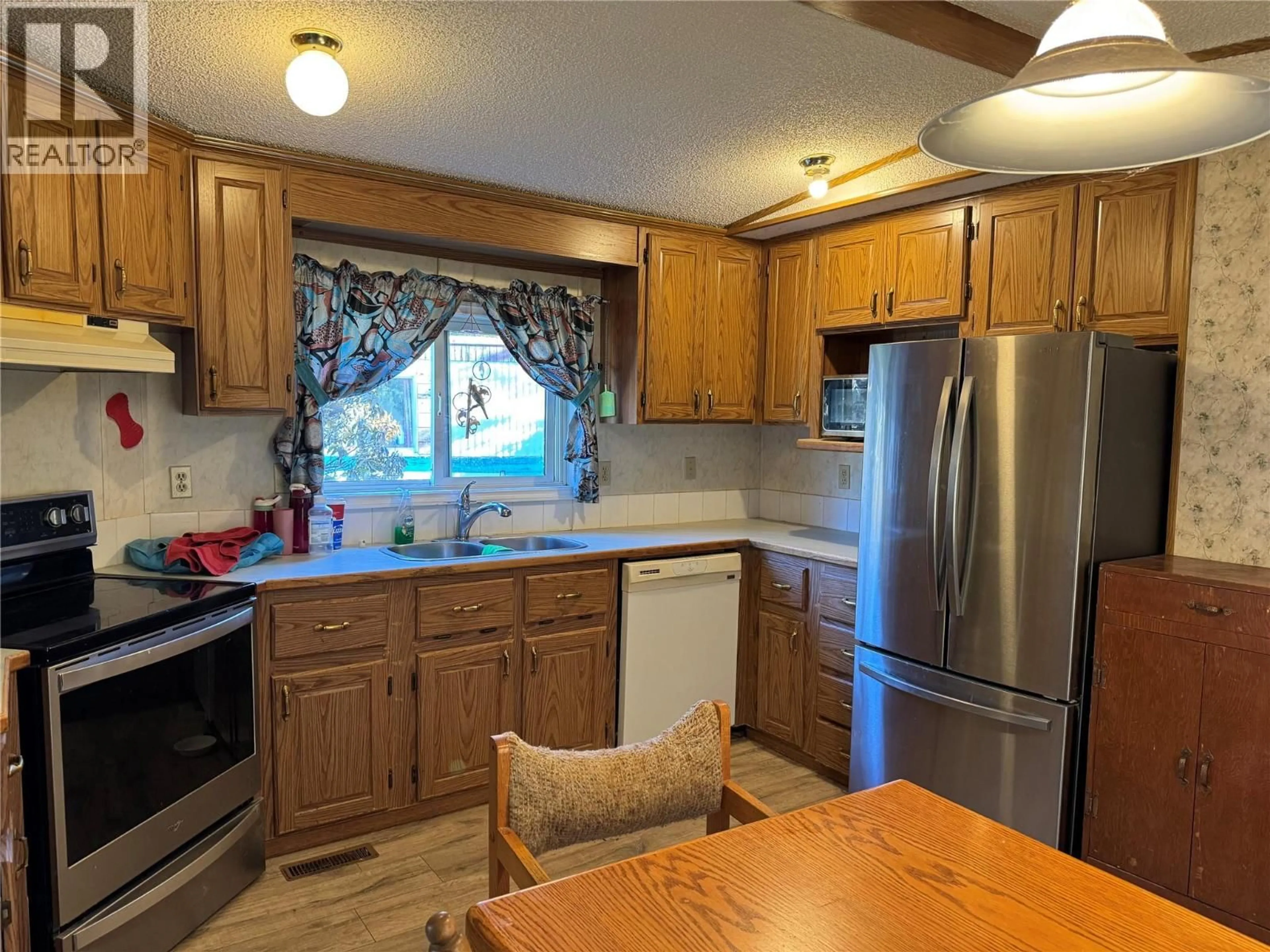 Standard kitchen, wood/laminate floor for A14 - 220 G & M ROAD, Kamloops British Columbia V2H1A4