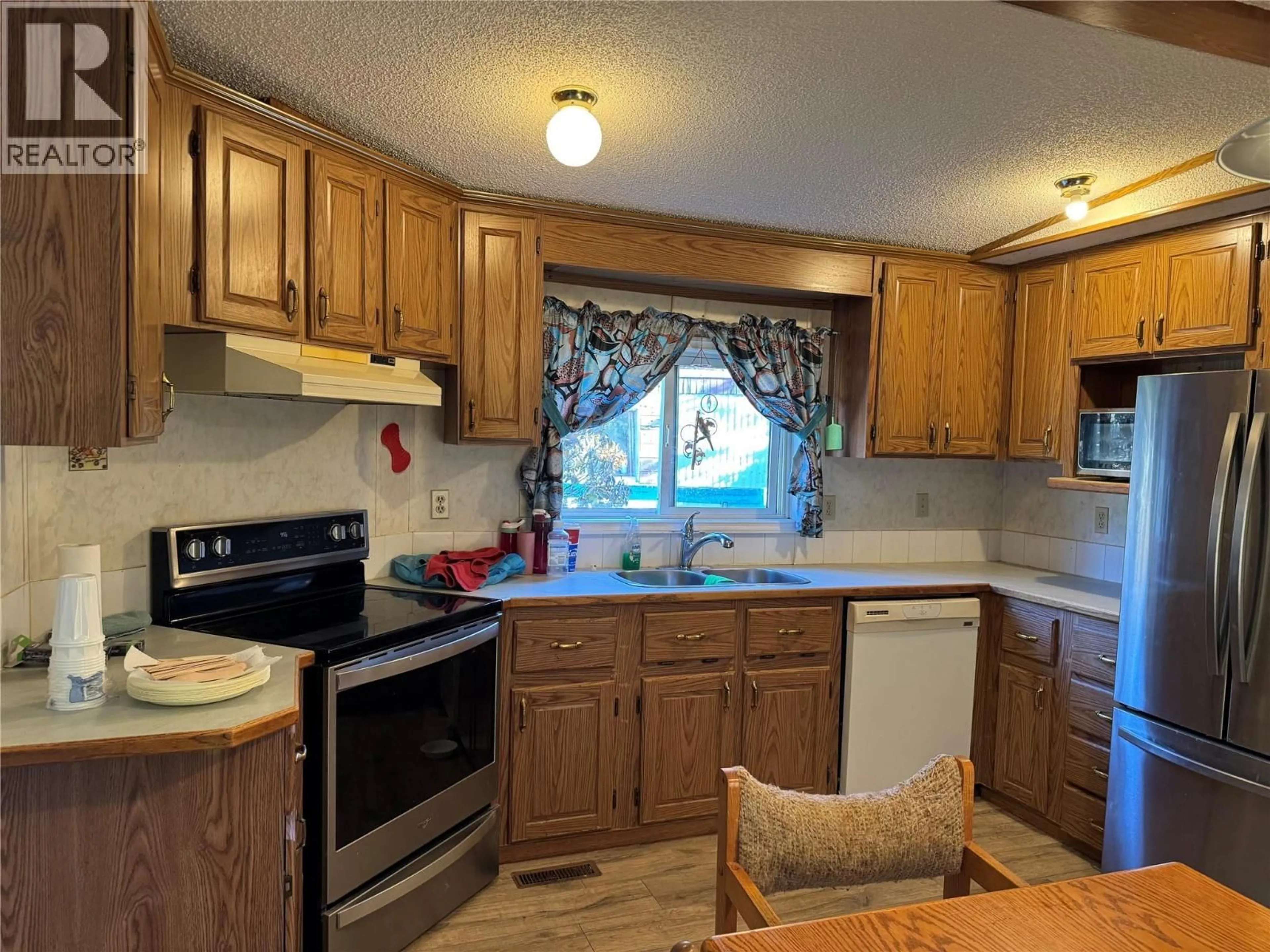 Standard kitchen, wood/laminate floor for A14 - 220 G & M ROAD, Kamloops British Columbia V2H1A4