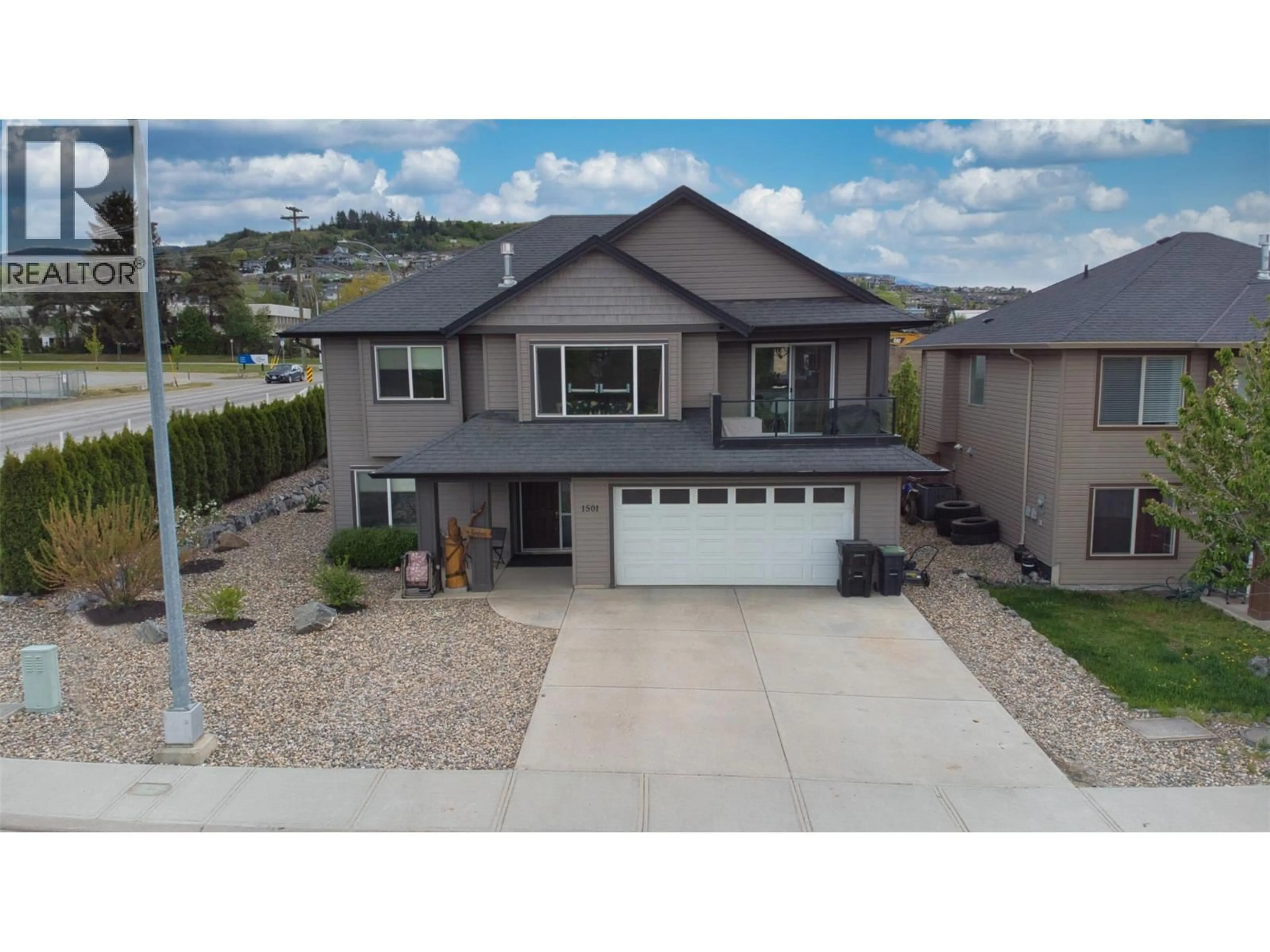 A pic from outside/outdoor area/front of a property/back of a property/a pic from drone, street for 1501 15TH AVENUE, Vernon British Columbia V1T9R4