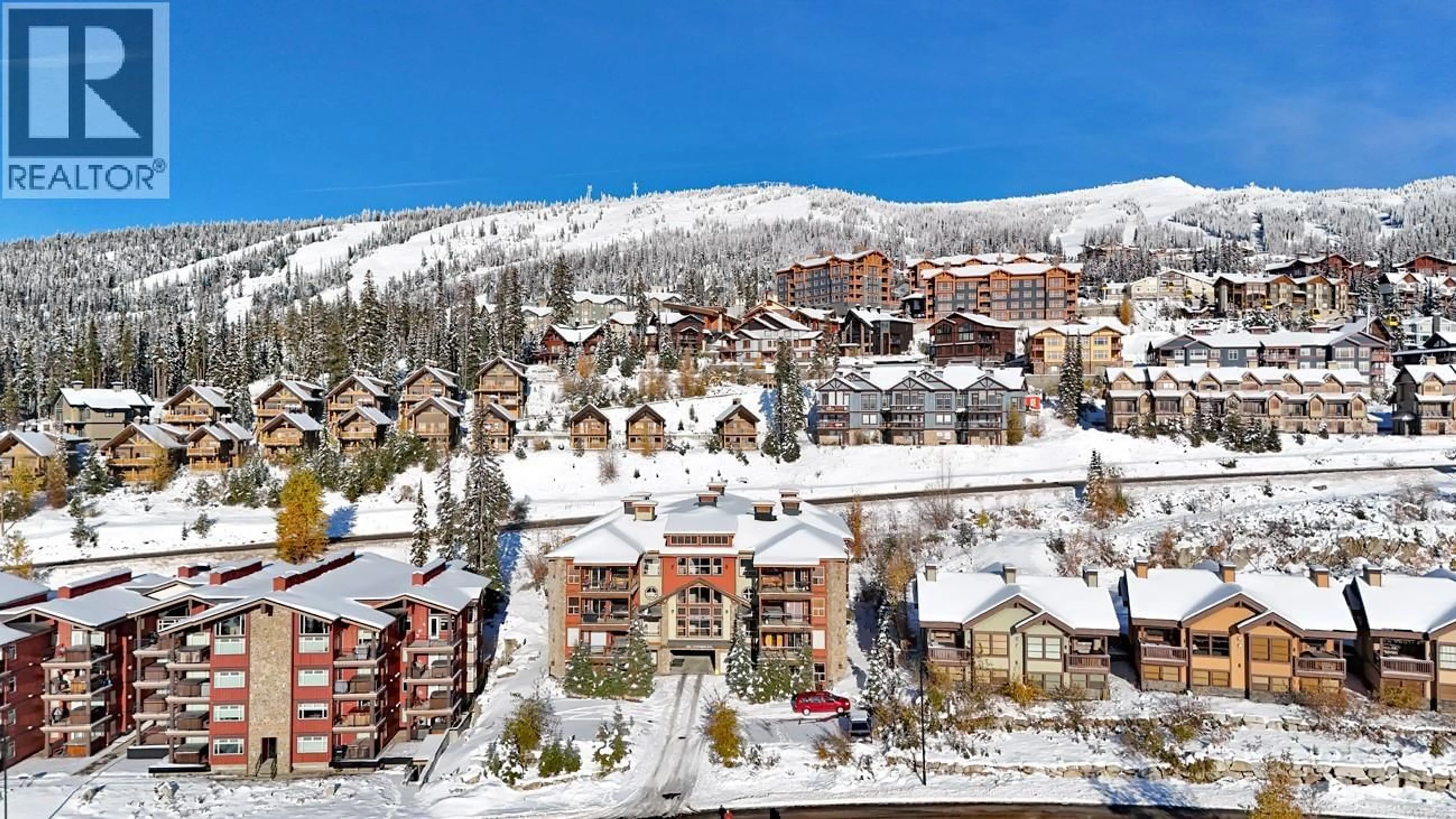 A pic from outside/outdoor area/front of a property/back of a property/a pic from drone, mountain view for 204 - 5050 SNOWBIRD WAY, Big White British Columbia V1P1T4