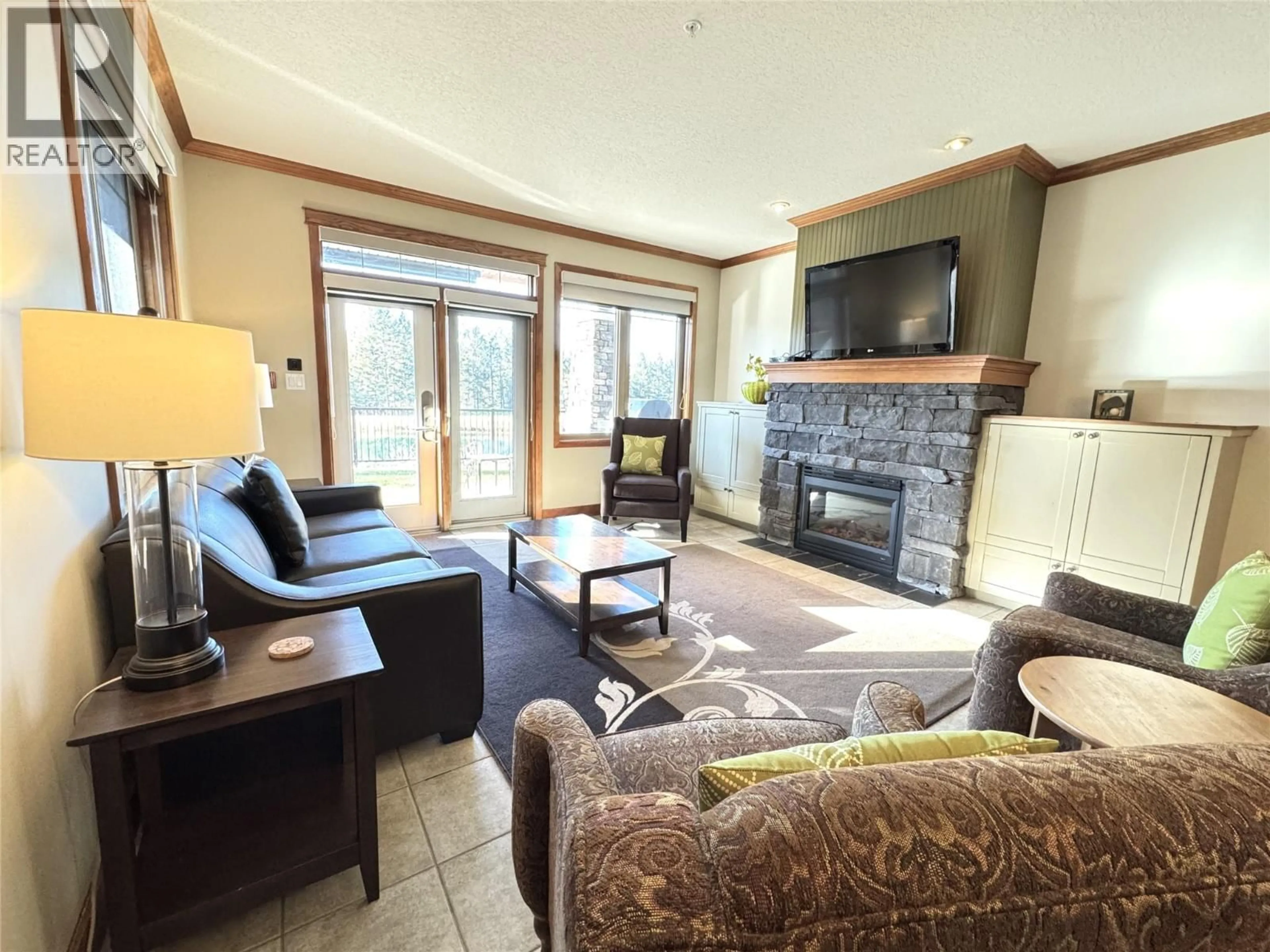 Living room with furniture, unknown for 211D - 200 BIGHORN BOULEVARD, Radium Hot Springs British Columbia V0A1M0