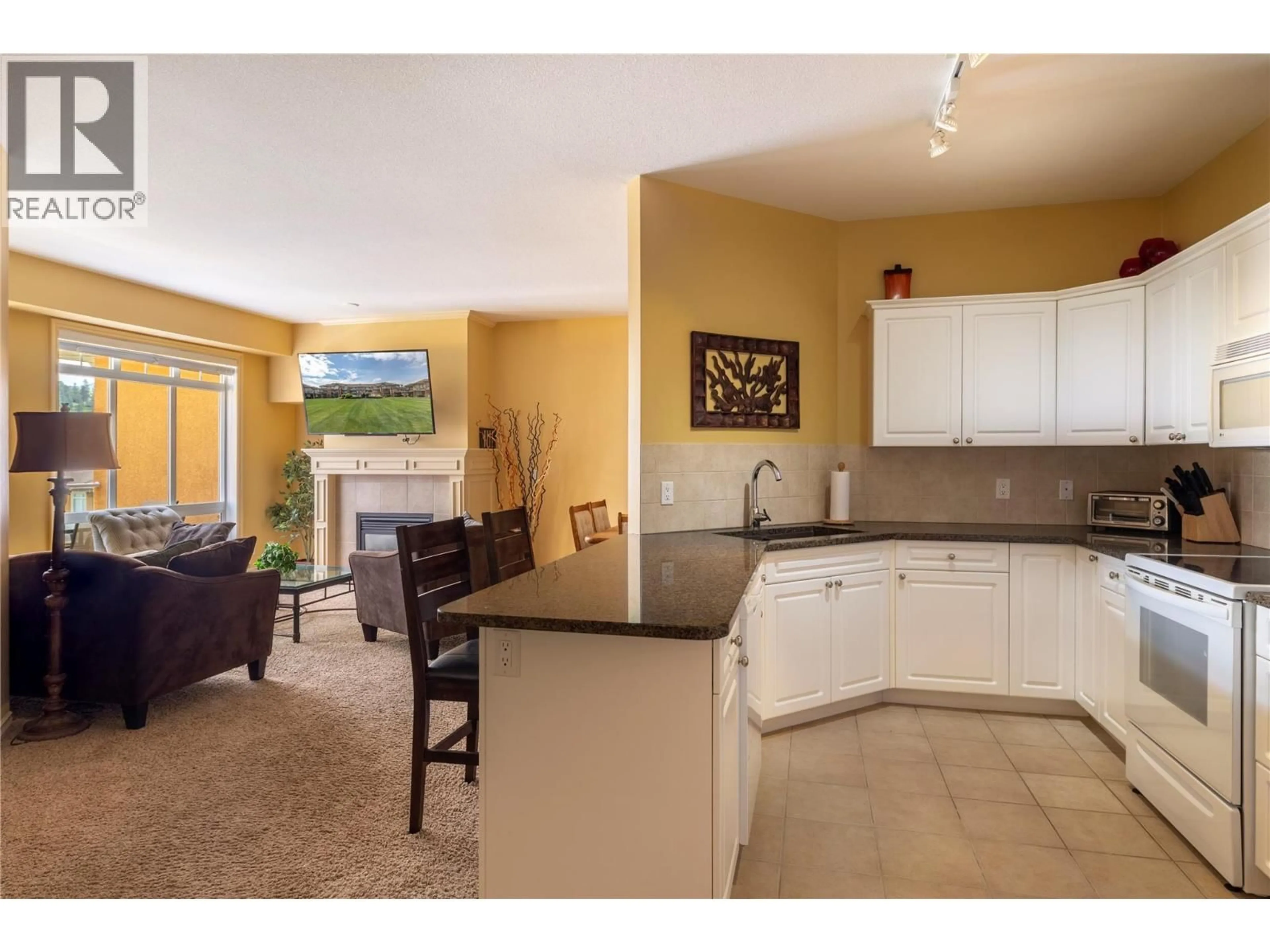 Open concept kitchen, unknown for 305 - 3570 WOODSDALE ROAD, Lake Country British Columbia V4V1Y9