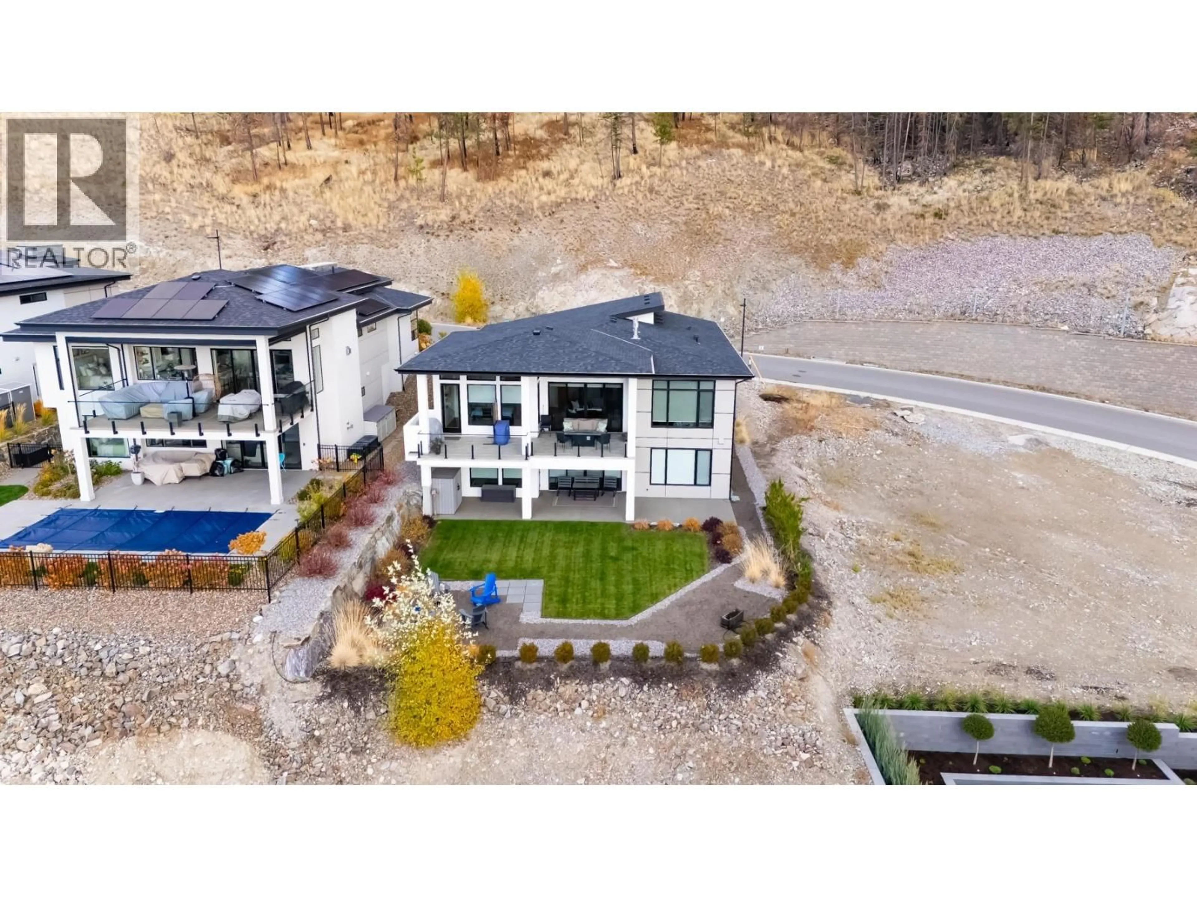 A pic from outside/outdoor area/front of a property/back of a property/a pic from drone, water/lake/river/ocean view for 9874 BEACON HILL DRIVE, Lake Country British Columbia V4V0A9