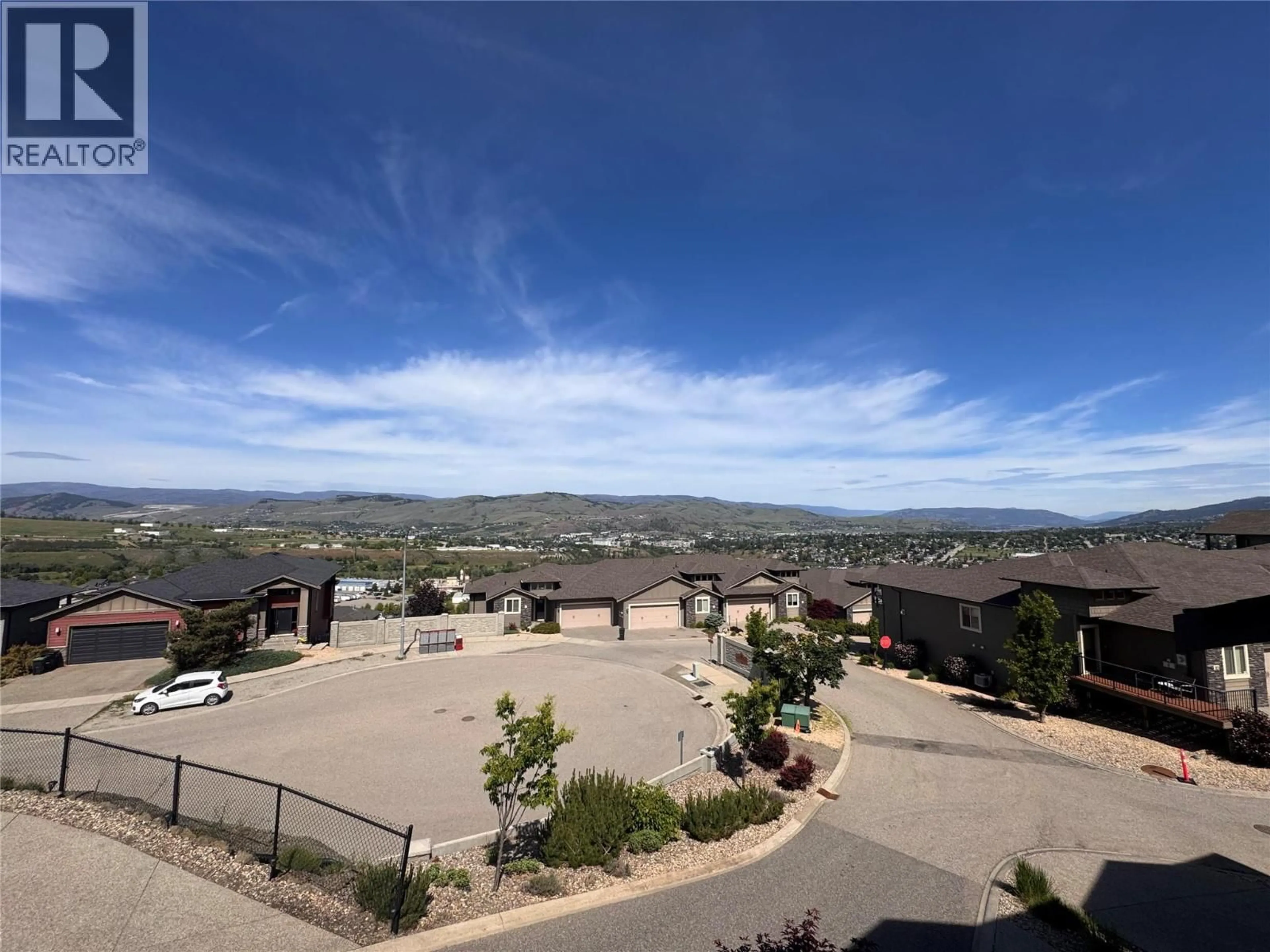 A pic from outside/outdoor area/front of a property/back of a property/a pic from drone, mountain view for 29 - 1040 MT.REVELSTOKE PLACE, Vernon British Columbia V1B4E3