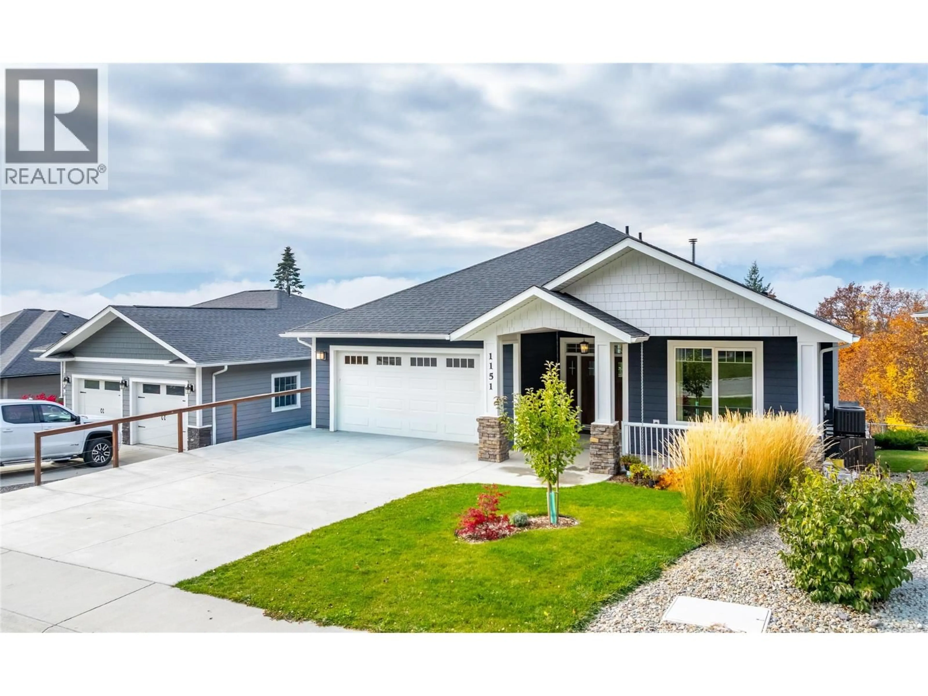 Home with vinyl exterior material, street for 1151 12TH AVENUE NORTH, Creston British Columbia V0B1G6