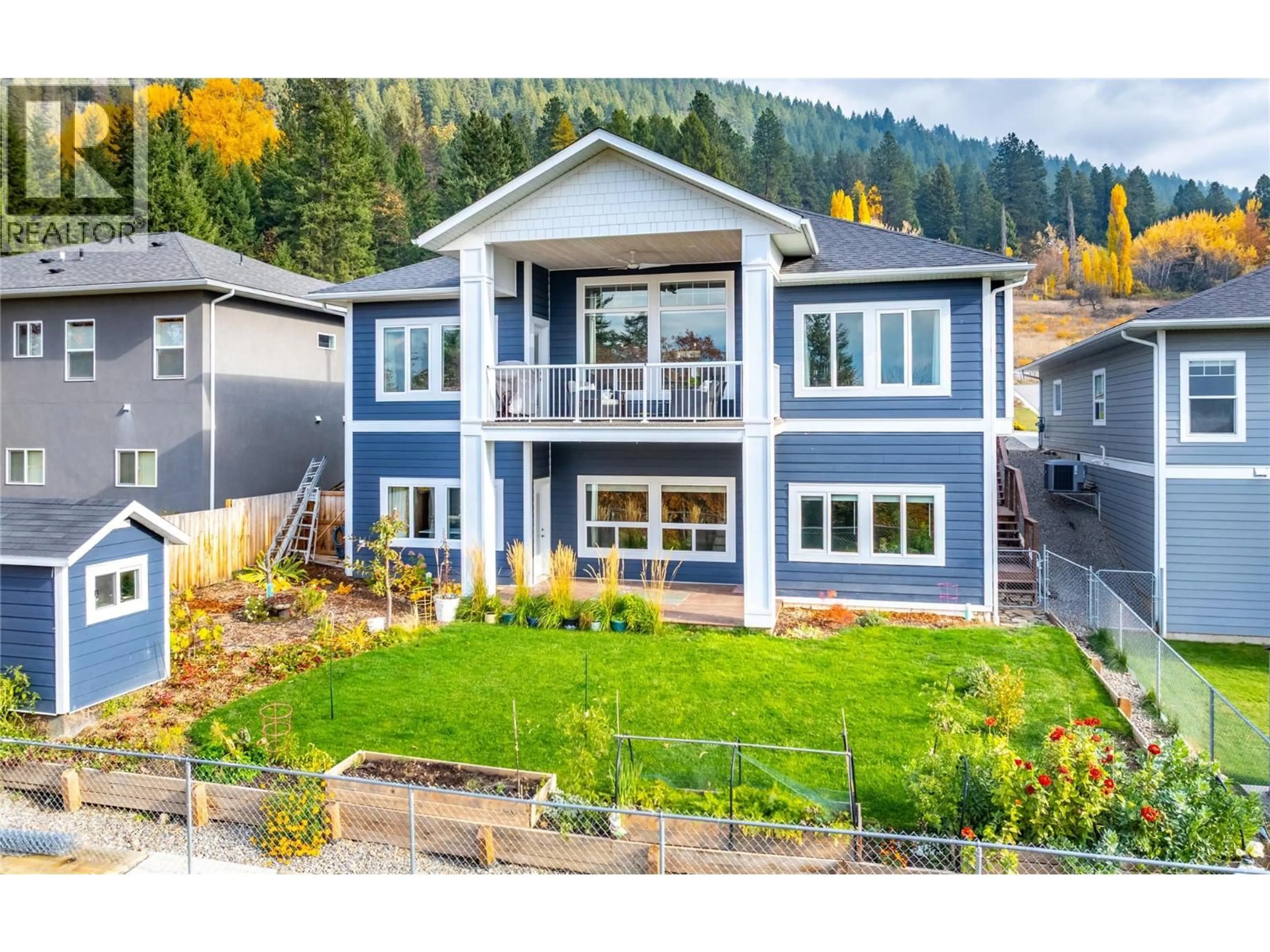 Home with vinyl exterior material, mountain view for 1151 12TH AVENUE NORTH, Creston British Columbia V0B1G6