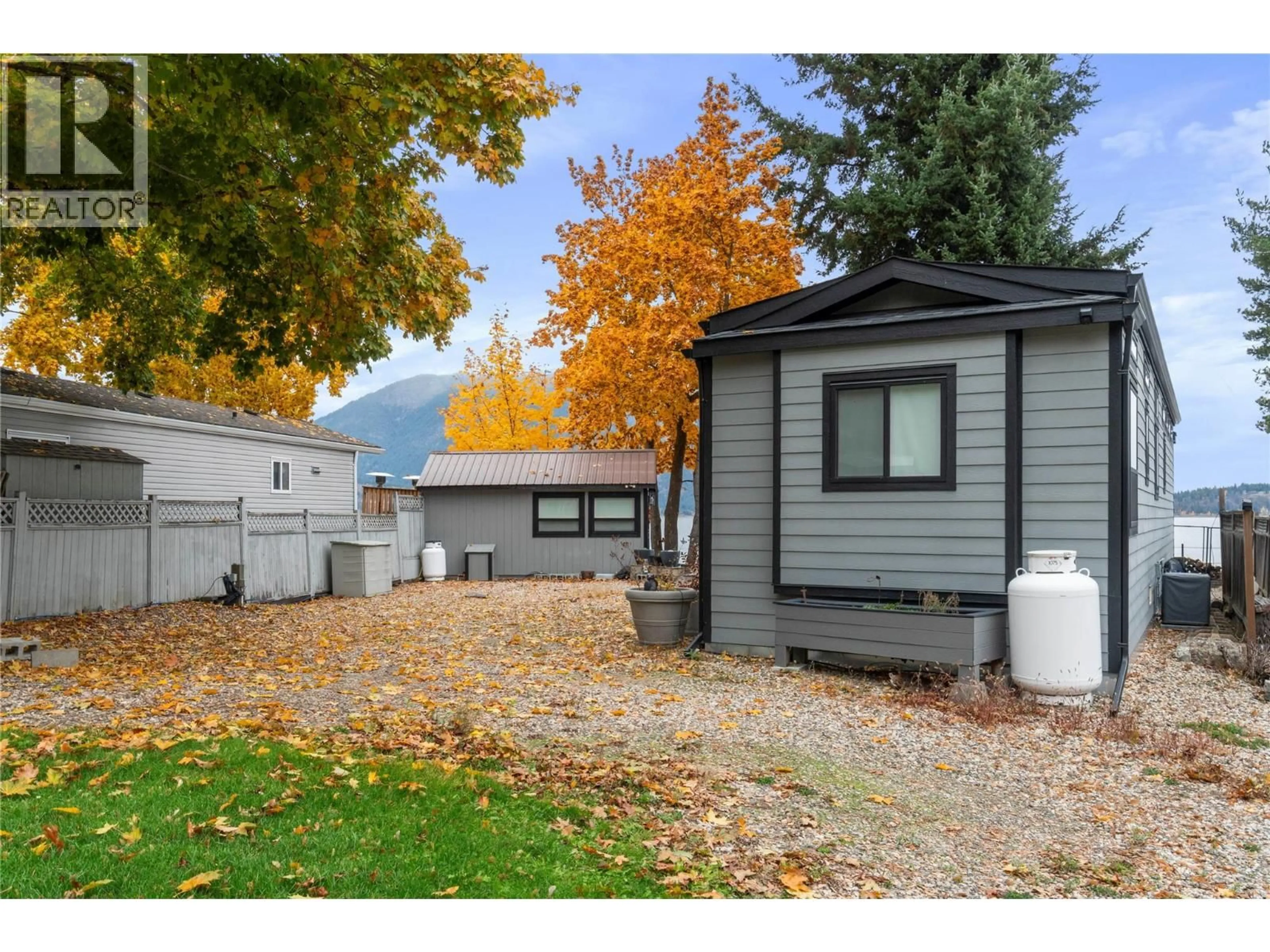 Home with vinyl exterior material, street for 5368 PIERRES POINT ROAD NORTHWEST, Salmon Arm British Columbia V1E4M2