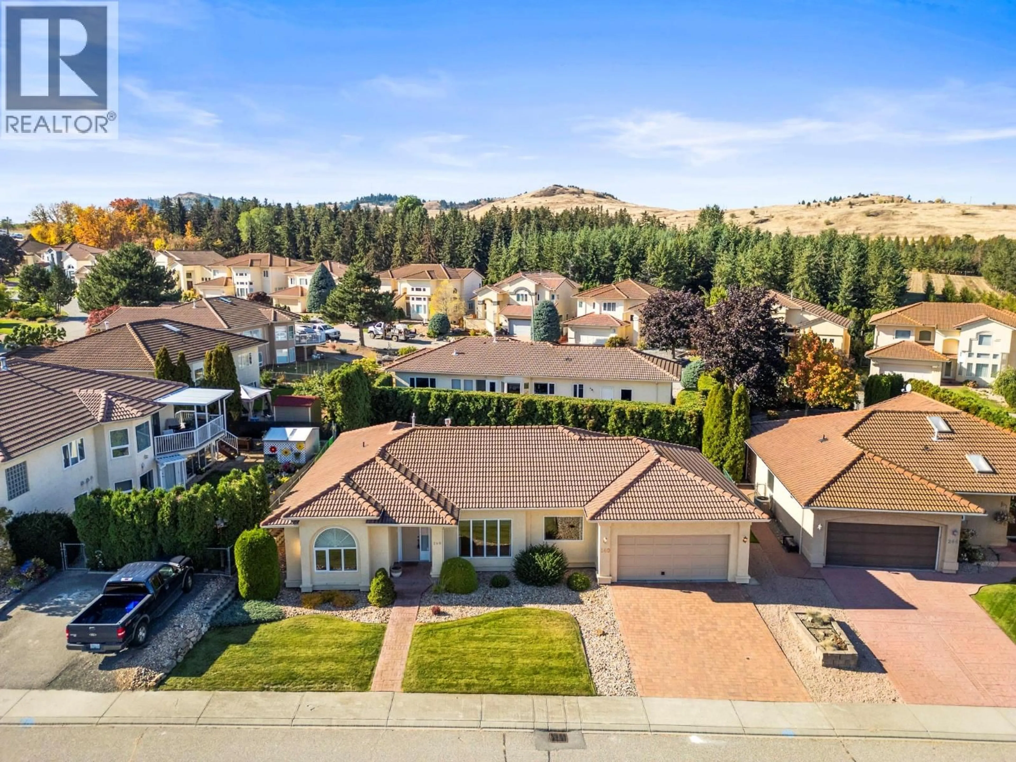 A pic from outside/outdoor area/front of a property/back of a property/a pic from drone, mountain view for 240 COUNTRY ESTATE DRIVE, Vernon British Columbia V1B2V3