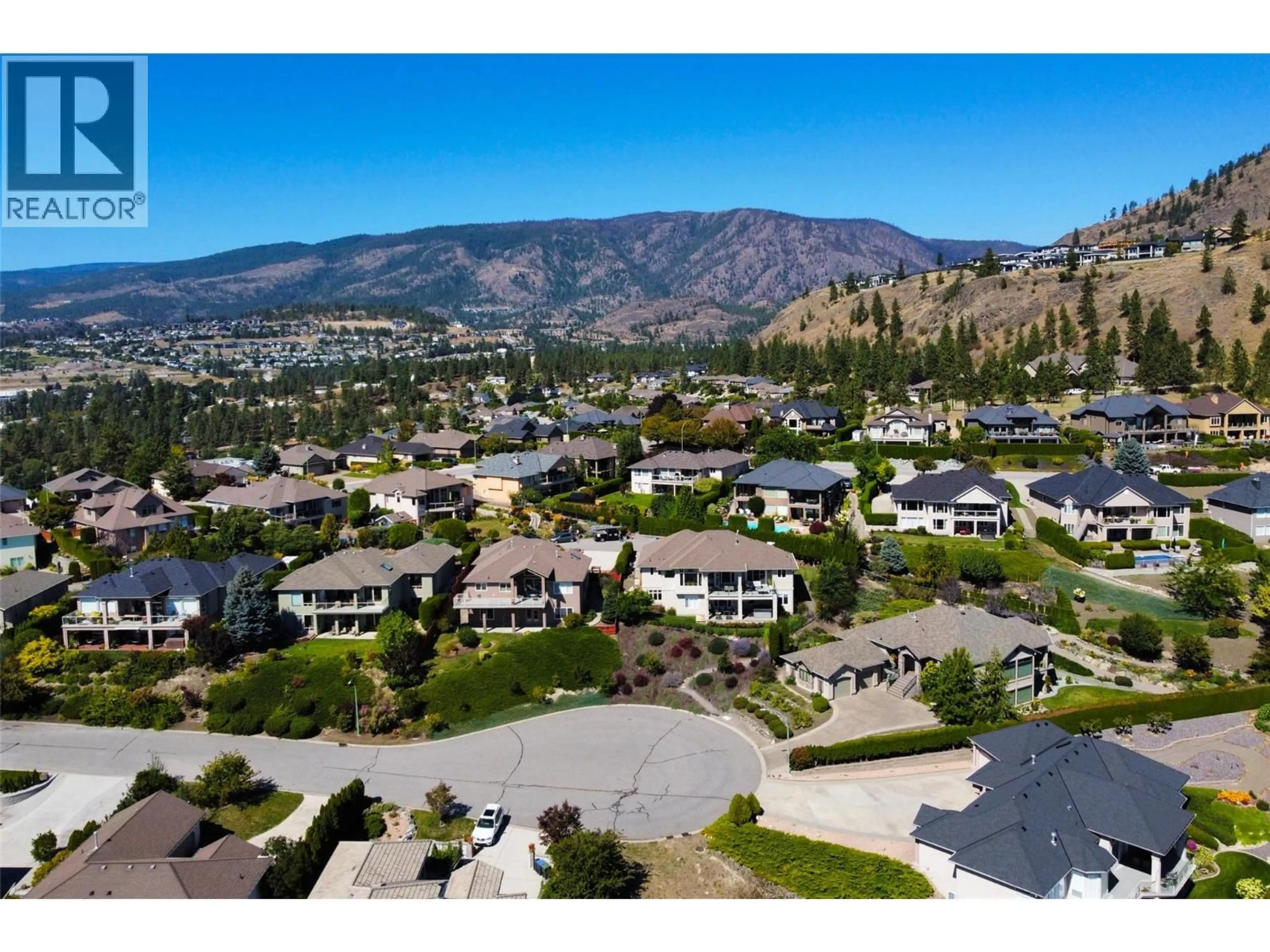 A pic from outside/outdoor area/front of a property/back of a property/a pic from drone, mountain view for 1608 BRAEBURN COURT, West Kelowna British Columbia V4T2V5