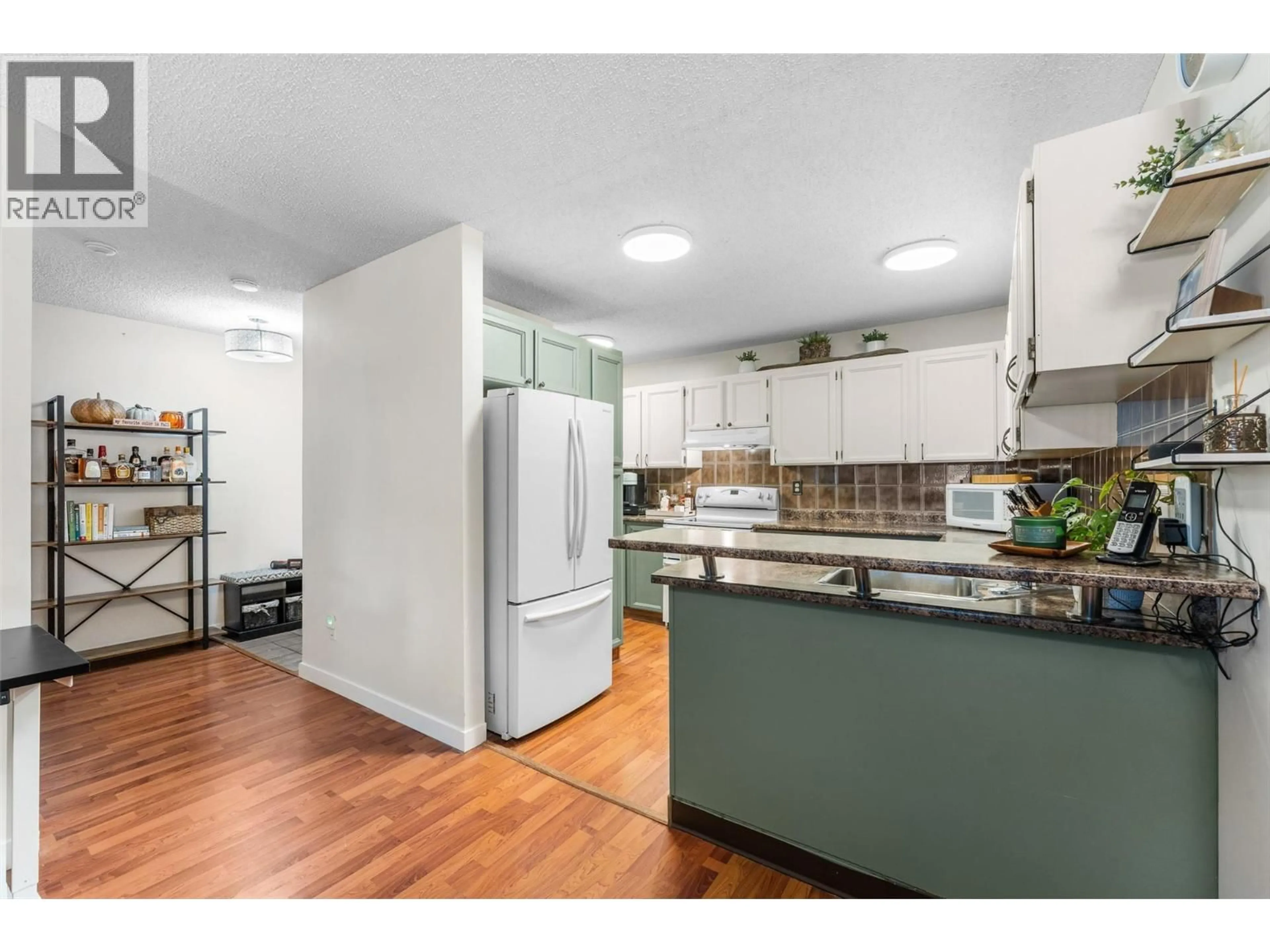 Open concept kitchen, unknown for 210 - 983 BERNARD AVENUE, Kelowna British Columbia V1Y6P7