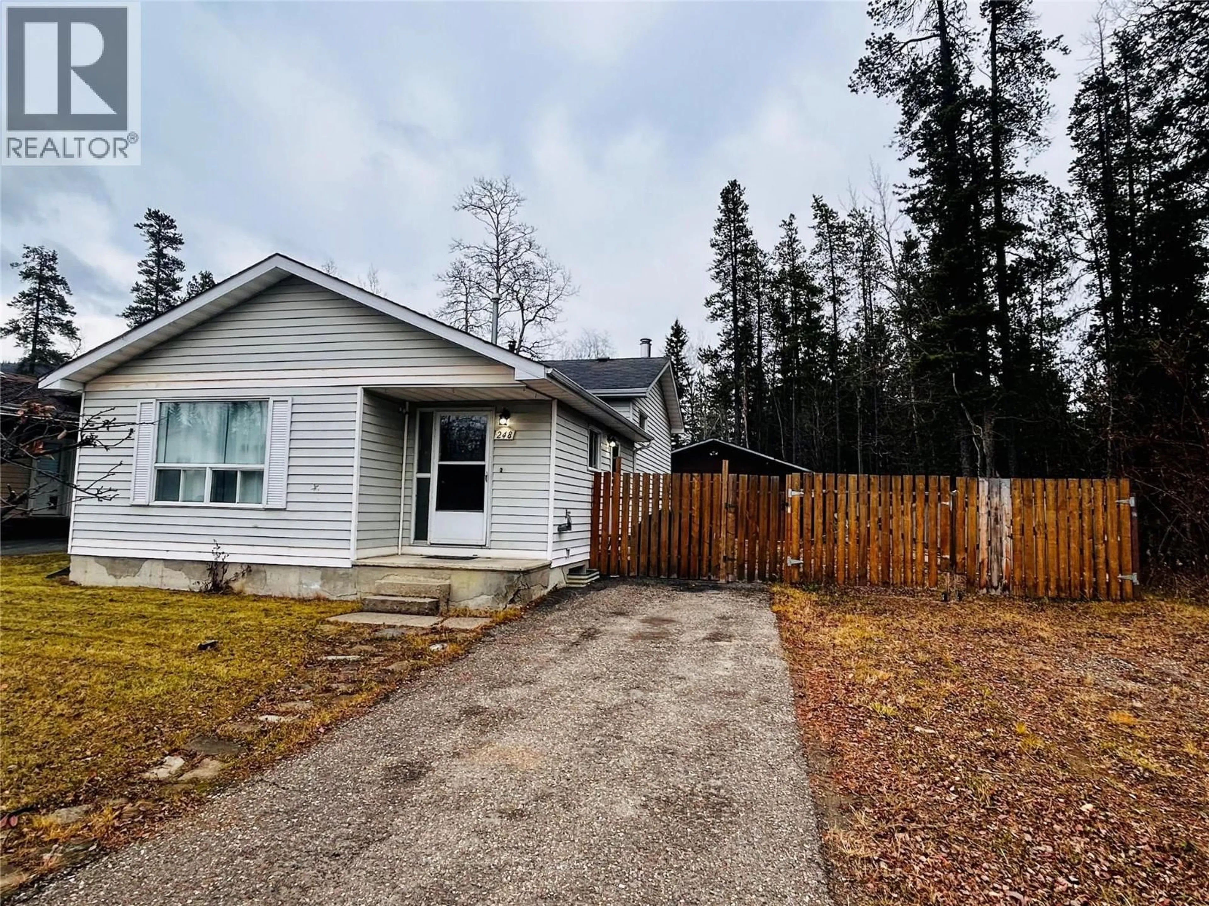 A pic from outside/outdoor area/front of a property/back of a property/a pic from drone, street for 248 PEACE RIVER CRESCENT, Tumbler Ridge British Columbia V0C2W0