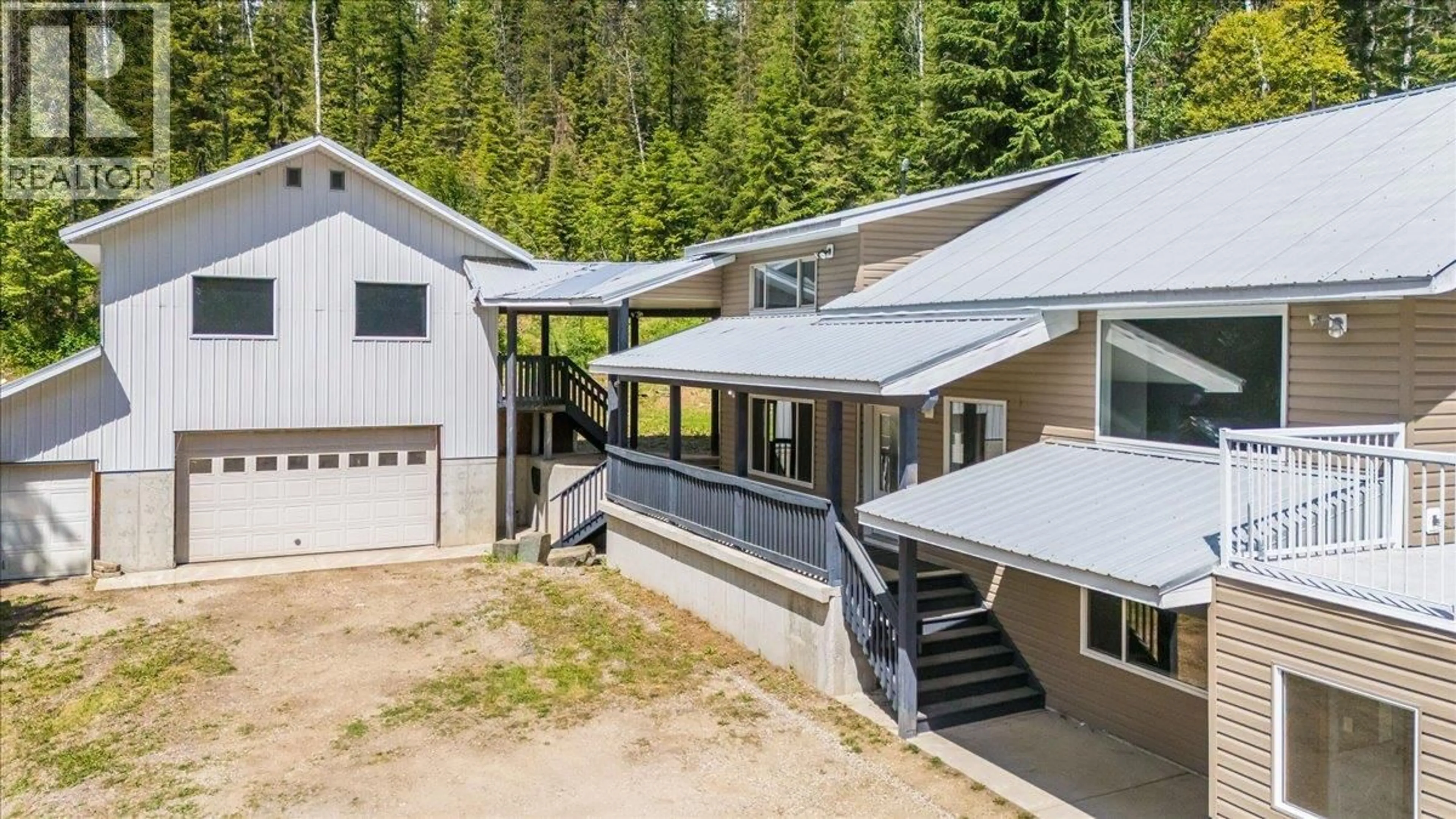 A pic from outside/outdoor area/front of a property/back of a property/a pic from drone, mountain view for 5270 CALLBECK ROAD, Nelson British Columbia V1L6N2