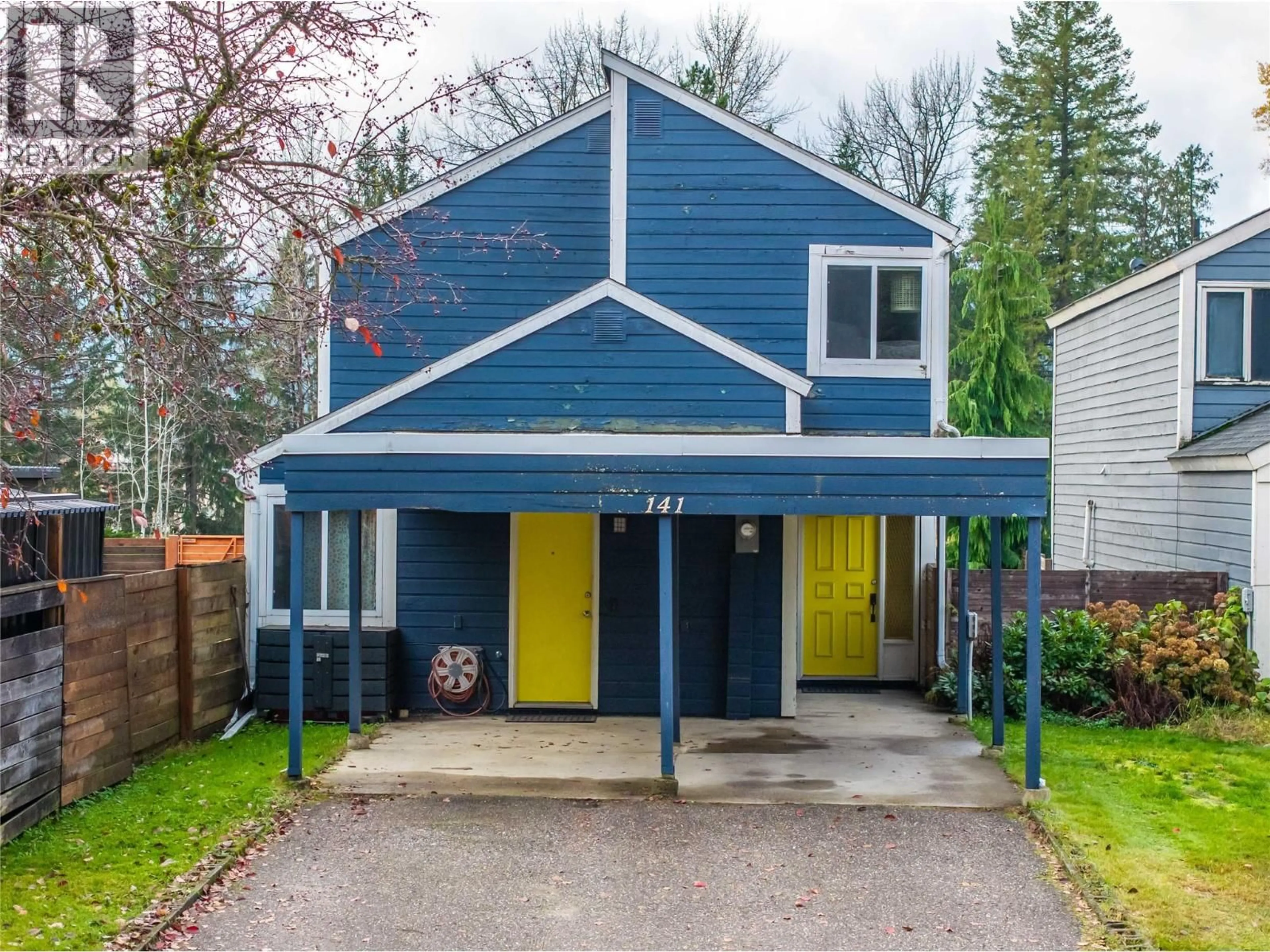 Home with vinyl exterior material, street for 141 GREELY CRESCENT, Revelstoke British Columbia V0E2S0