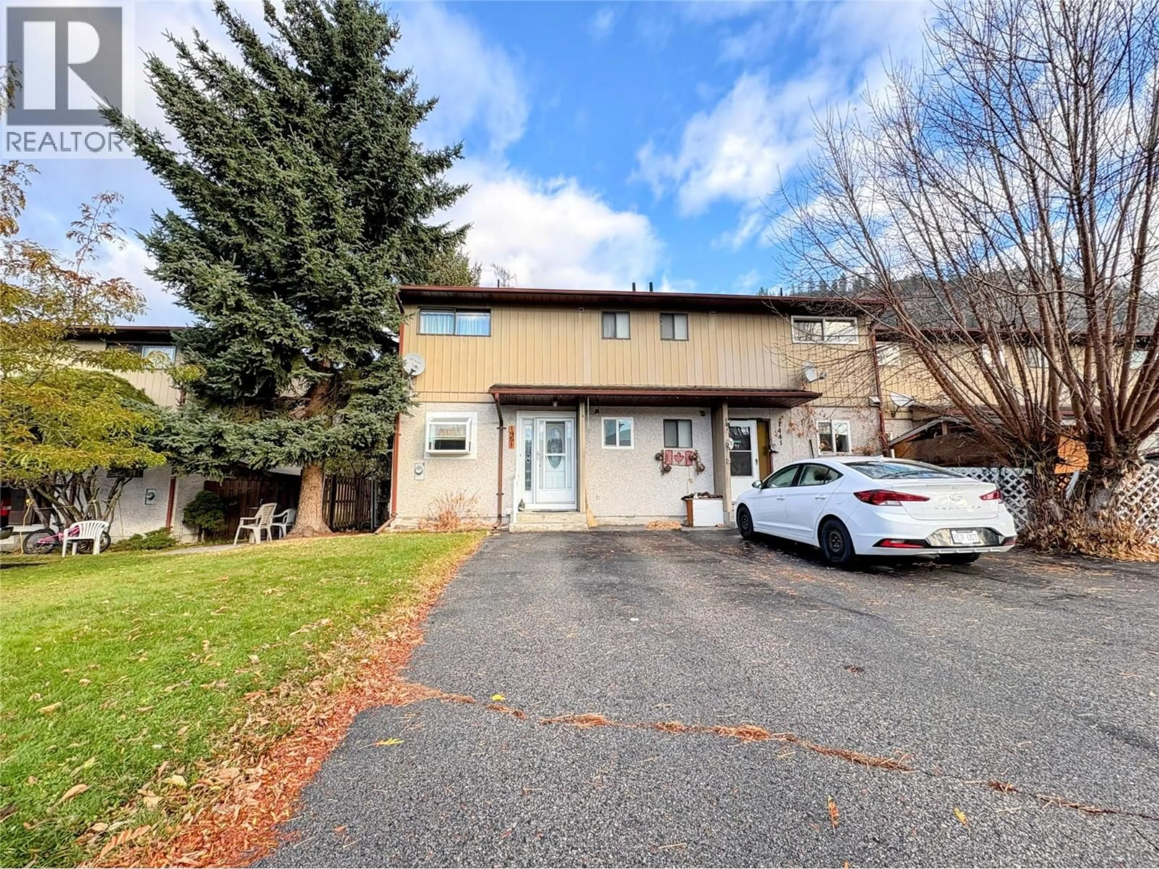 A pic from outside/outdoor area/front of a property/back of a property/a pic from drone, street for 109 - 1451 78TH AVENUE, Grand Forks British Columbia V0H1H0