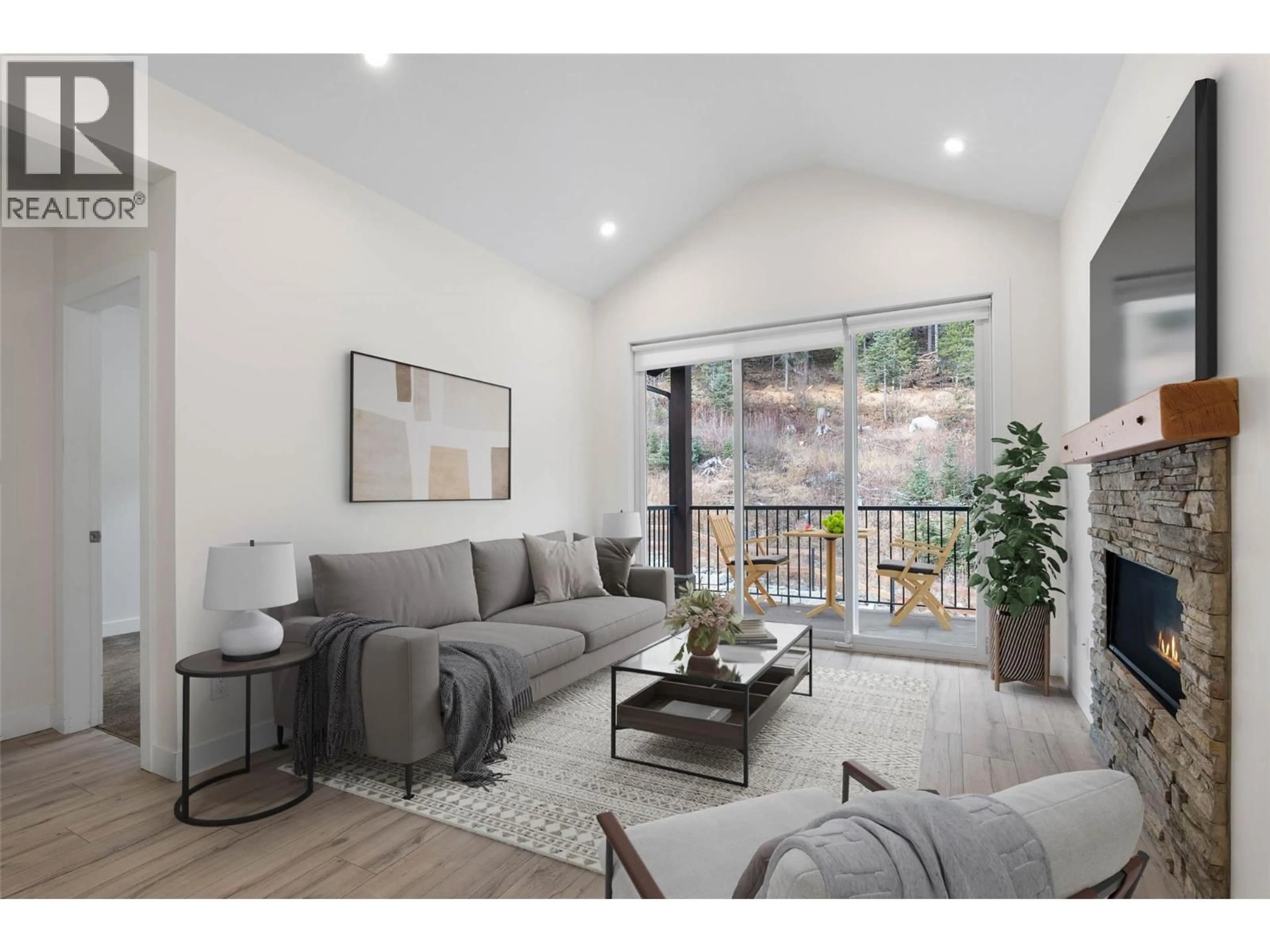 Living room with furniture, wood/laminate floor for 29 - 1240 ALPINE ROAD, Sun Peaks British Columbia V0E5N0
