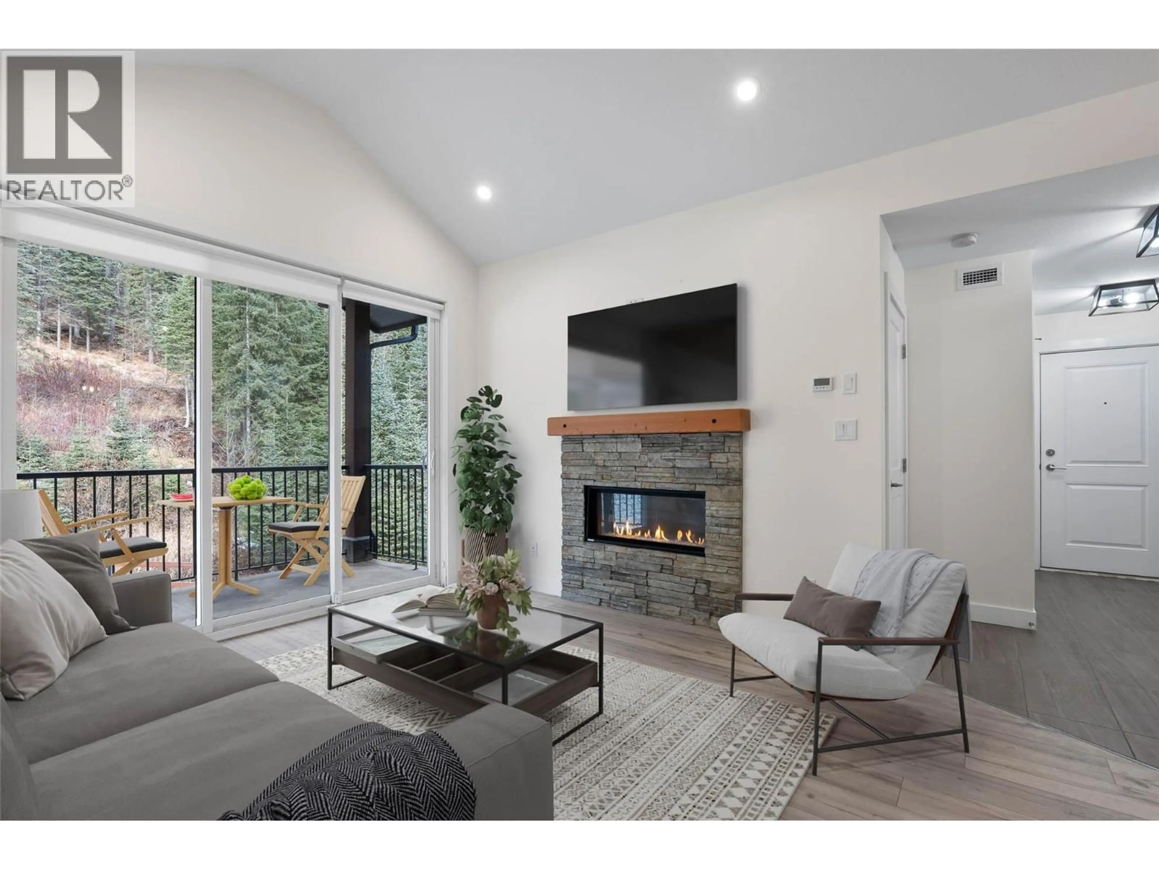 Living room with furniture, wood/laminate floor for 29 - 1240 ALPINE ROAD, Sun Peaks British Columbia V0E5N0