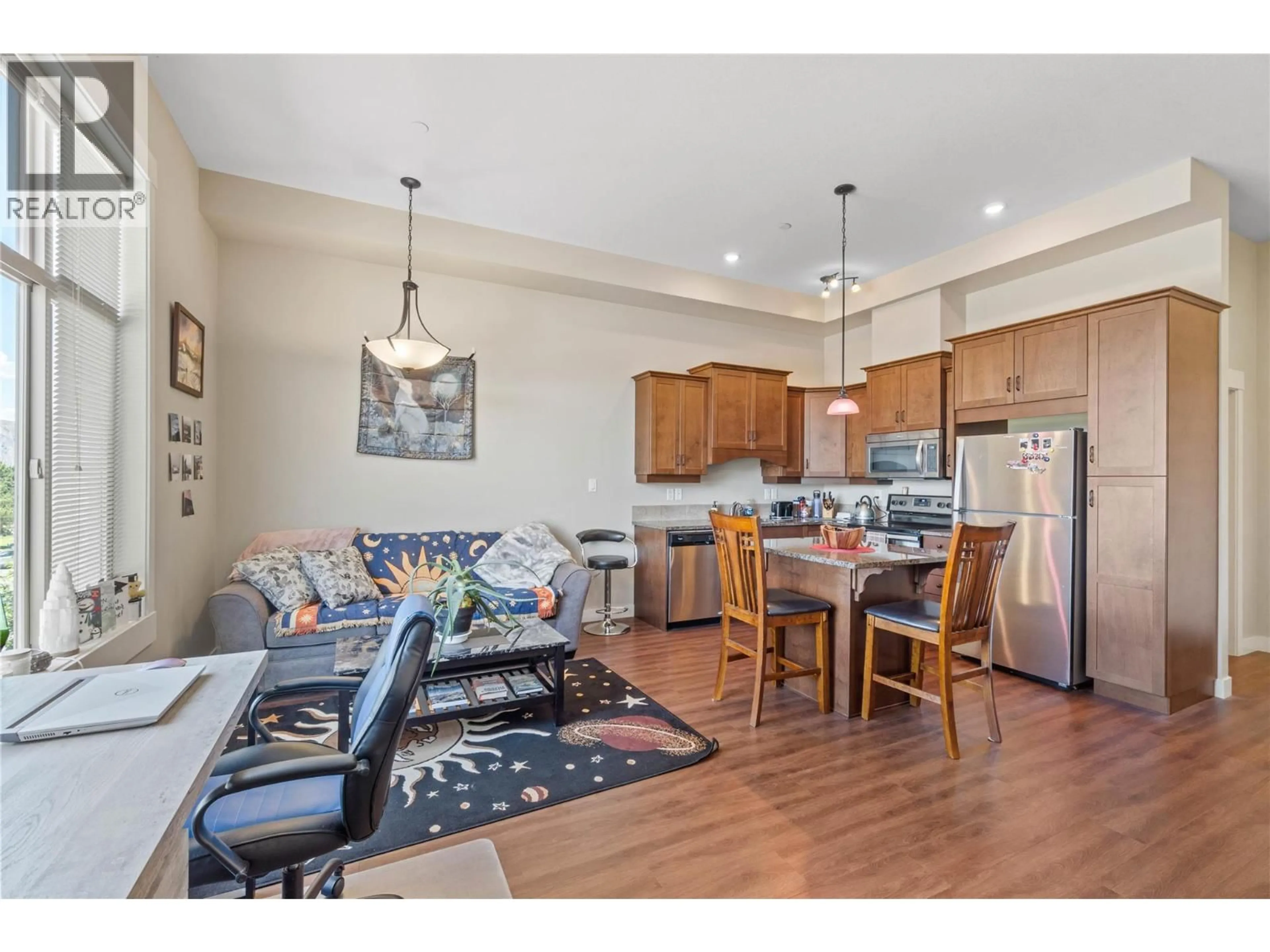 Open concept kitchen, wood/laminate floor for 216 - 755 MCGILL ROAD, Kamloops British Columbia V2C0B6