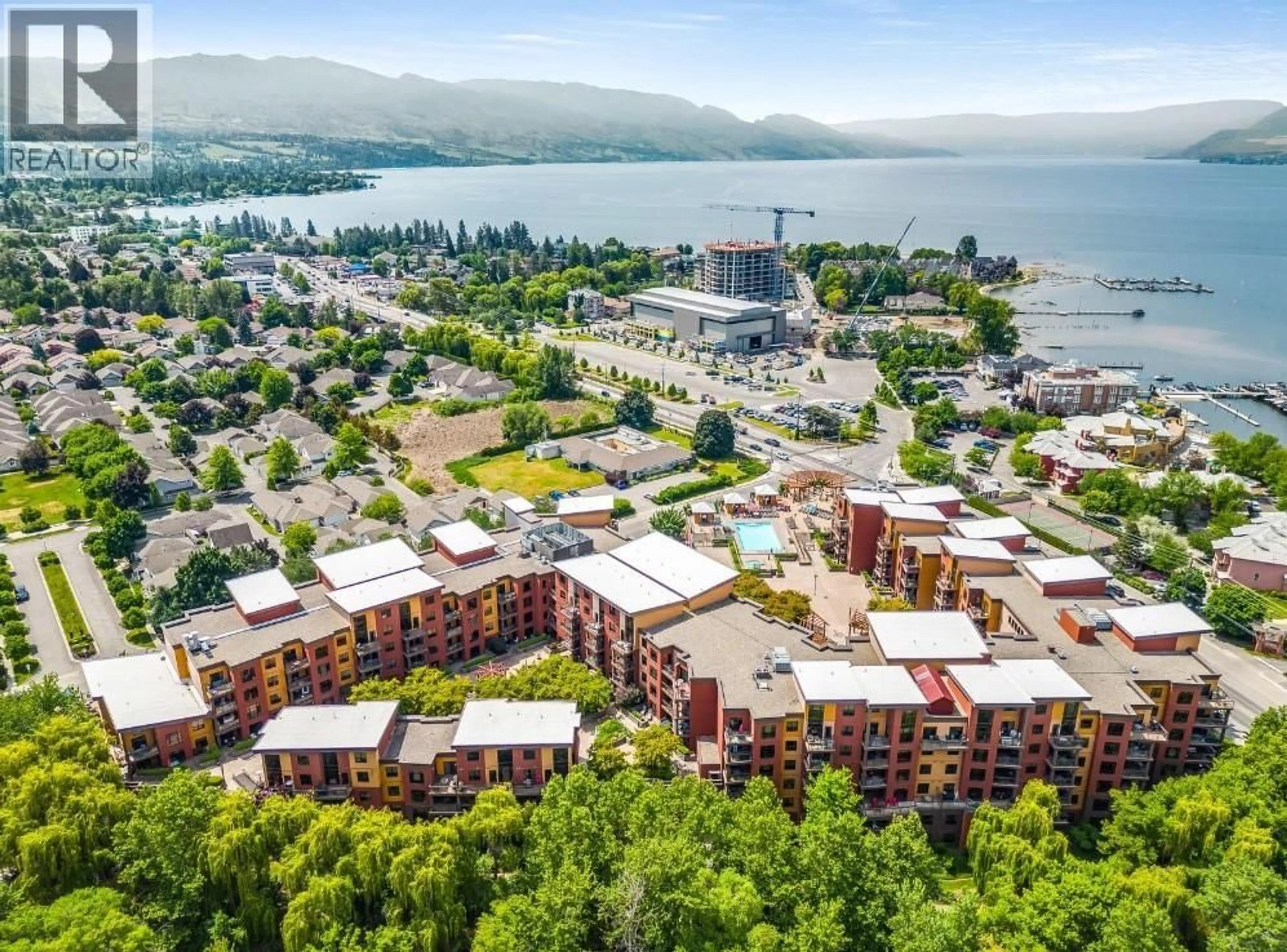 A pic from outside/outdoor area/front of a property/back of a property/a pic from drone, mountain view for 633 - 654 COOK ROAD, Kelowna British Columbia V1W3G7
