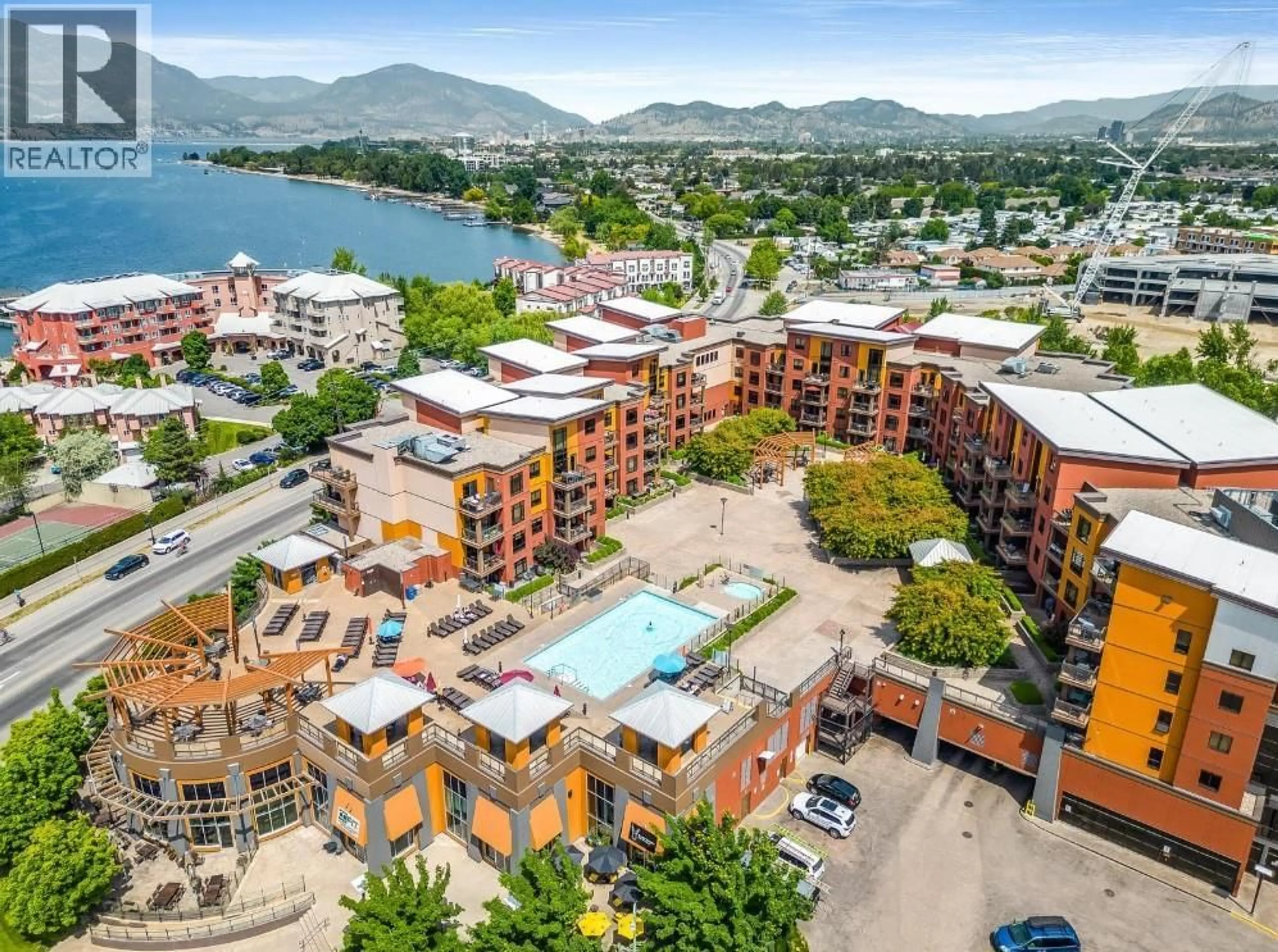 A pic from outside/outdoor area/front of a property/back of a property/a pic from drone, water/lake/river/ocean view for 633 - 654 COOK ROAD, Kelowna British Columbia V1W3G7