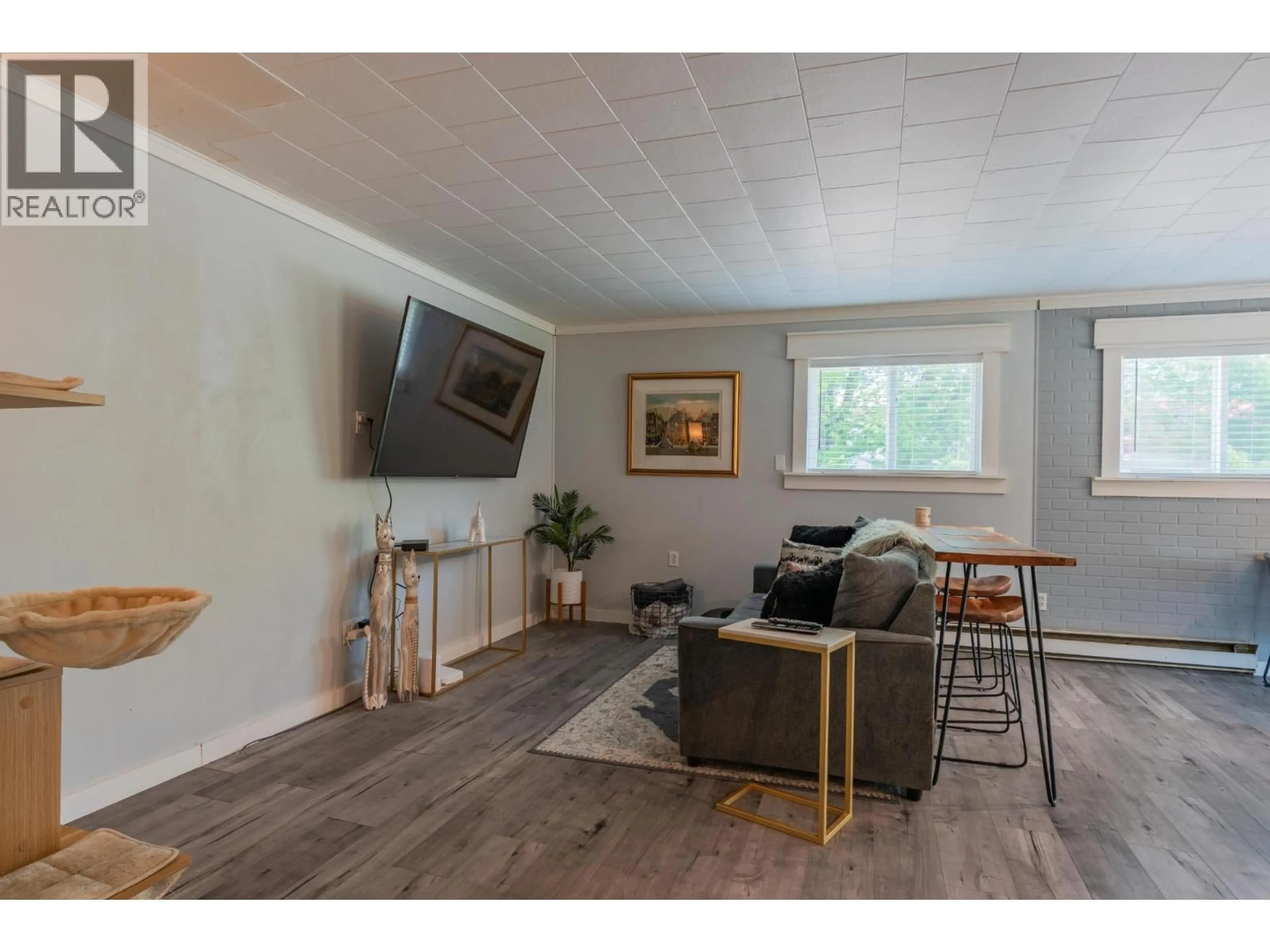 Living room with furniture, wood/laminate floor for 2194 SIXTH AVENUE, Trail British Columbia V1R3B7