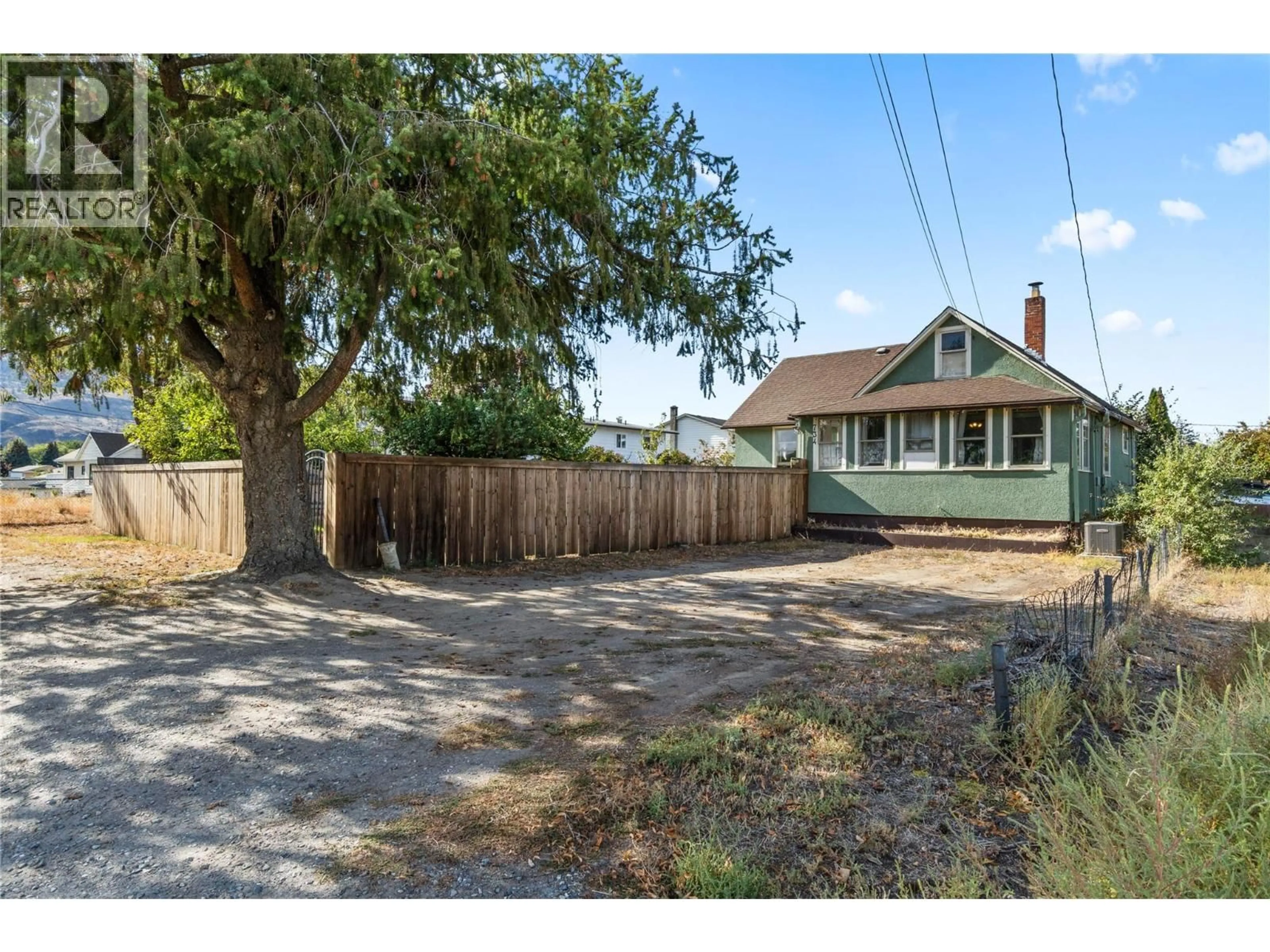 A pic from outside/outdoor area/front of a property/back of a property/a pic from drone, street for 734 SINGH STREET, Kamloops British Columbia V2B5C5