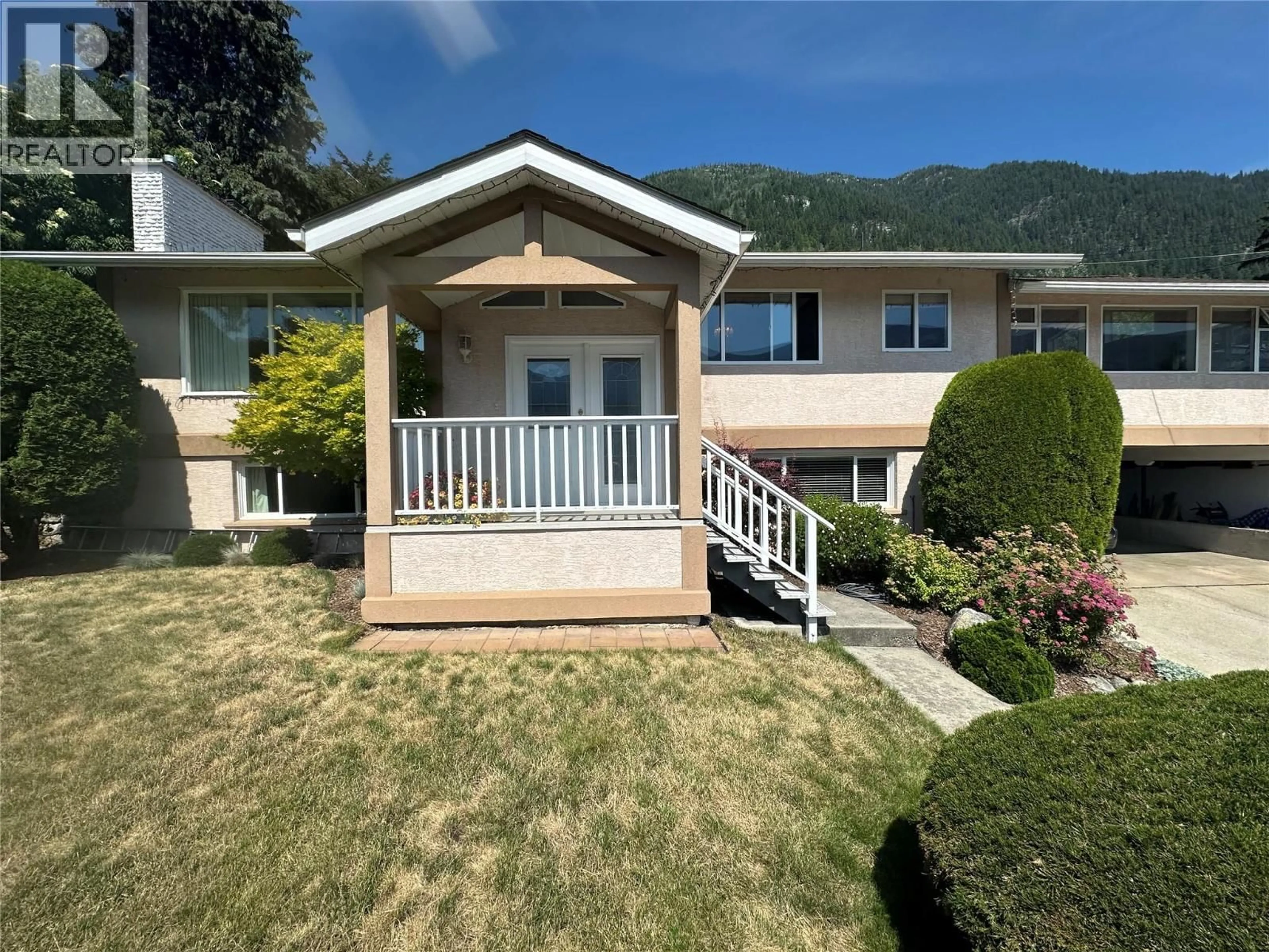 Home with vinyl exterior material, mountain view for 649 JOHNSTONE ROAD, Nelson British Columbia V1L6H8