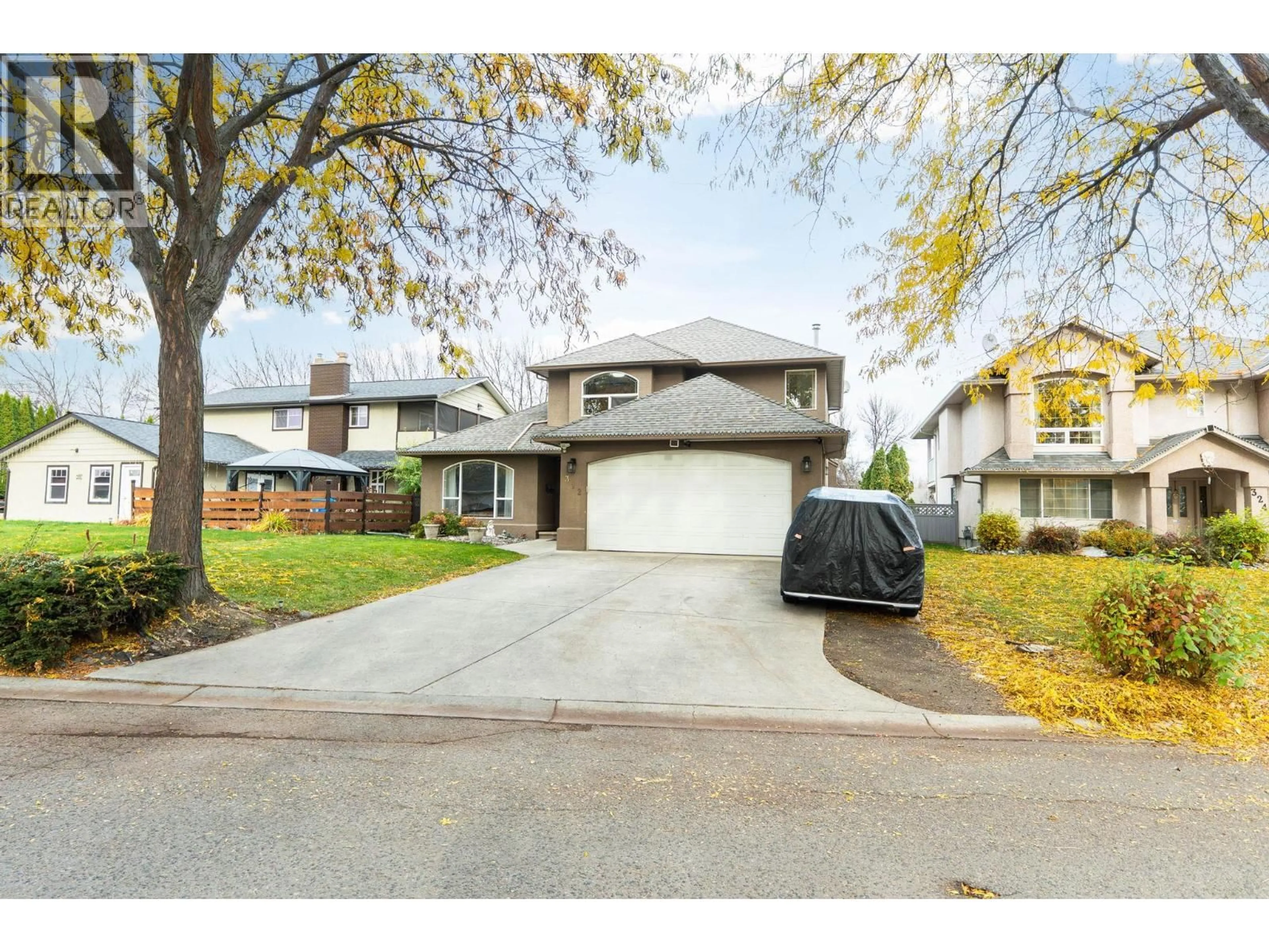 Home with vinyl exterior material, street for 312 FIZET AVENUE, Kelowna British Columbia V1X7P5