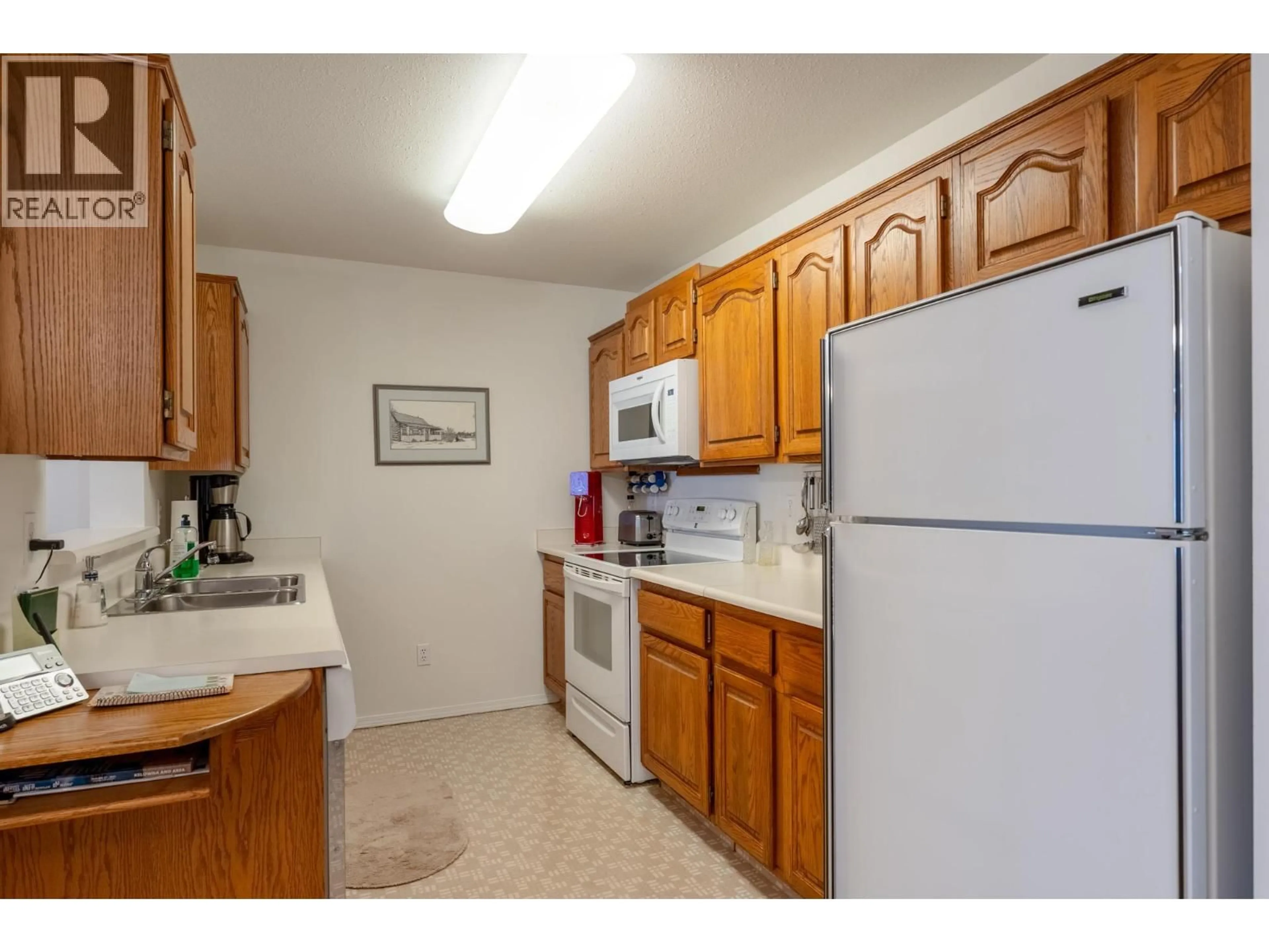 Standard kitchen, unknown for 208 - 1329 KLO ROAD, Kelowna British Columbia V1W3N9