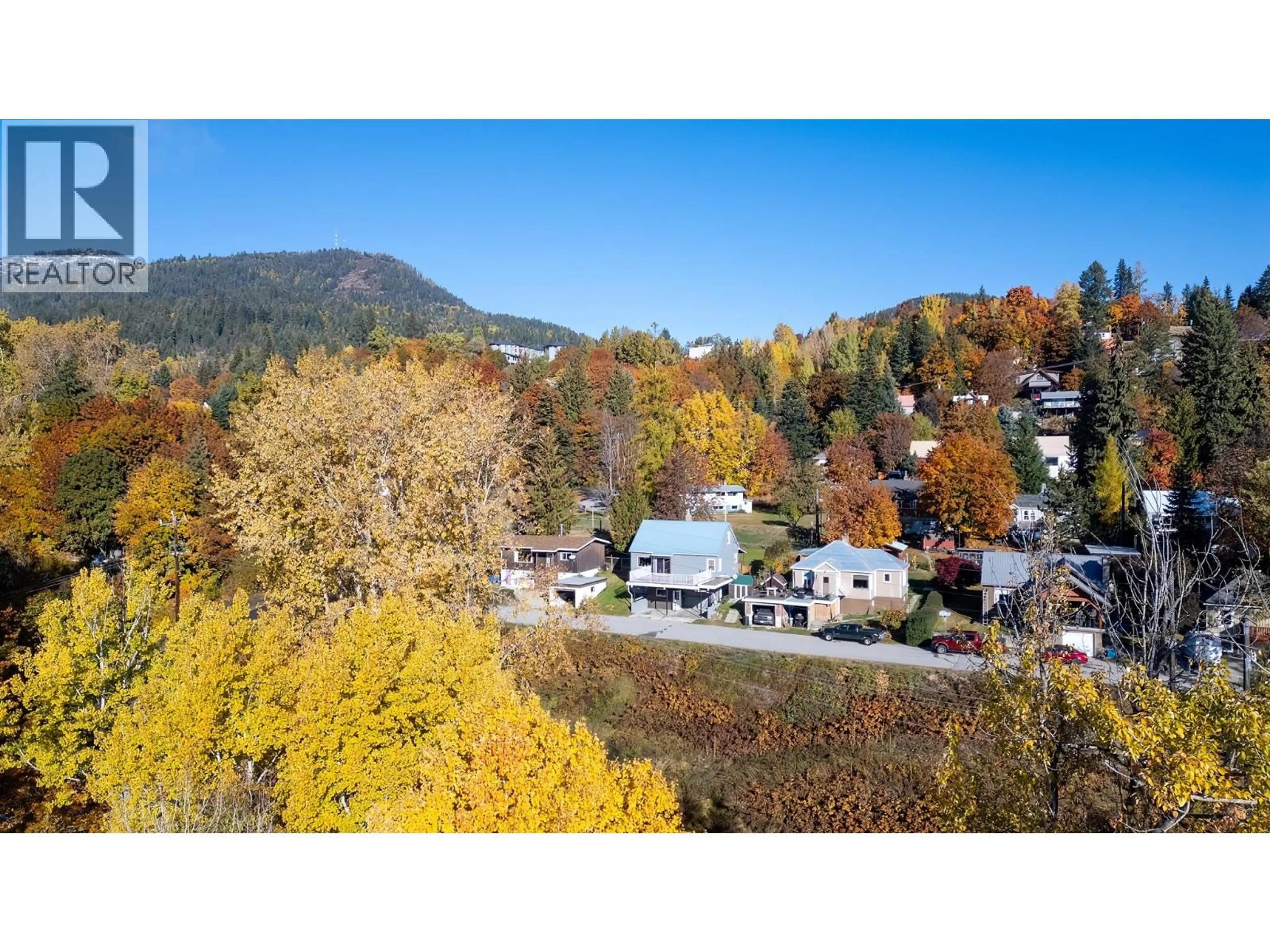 A pic from outside/outdoor area/front of a property/back of a property/a pic from drone, mountain view for 2130 VICTORIA AVENUE, Rossland British Columbia V0G1Y0