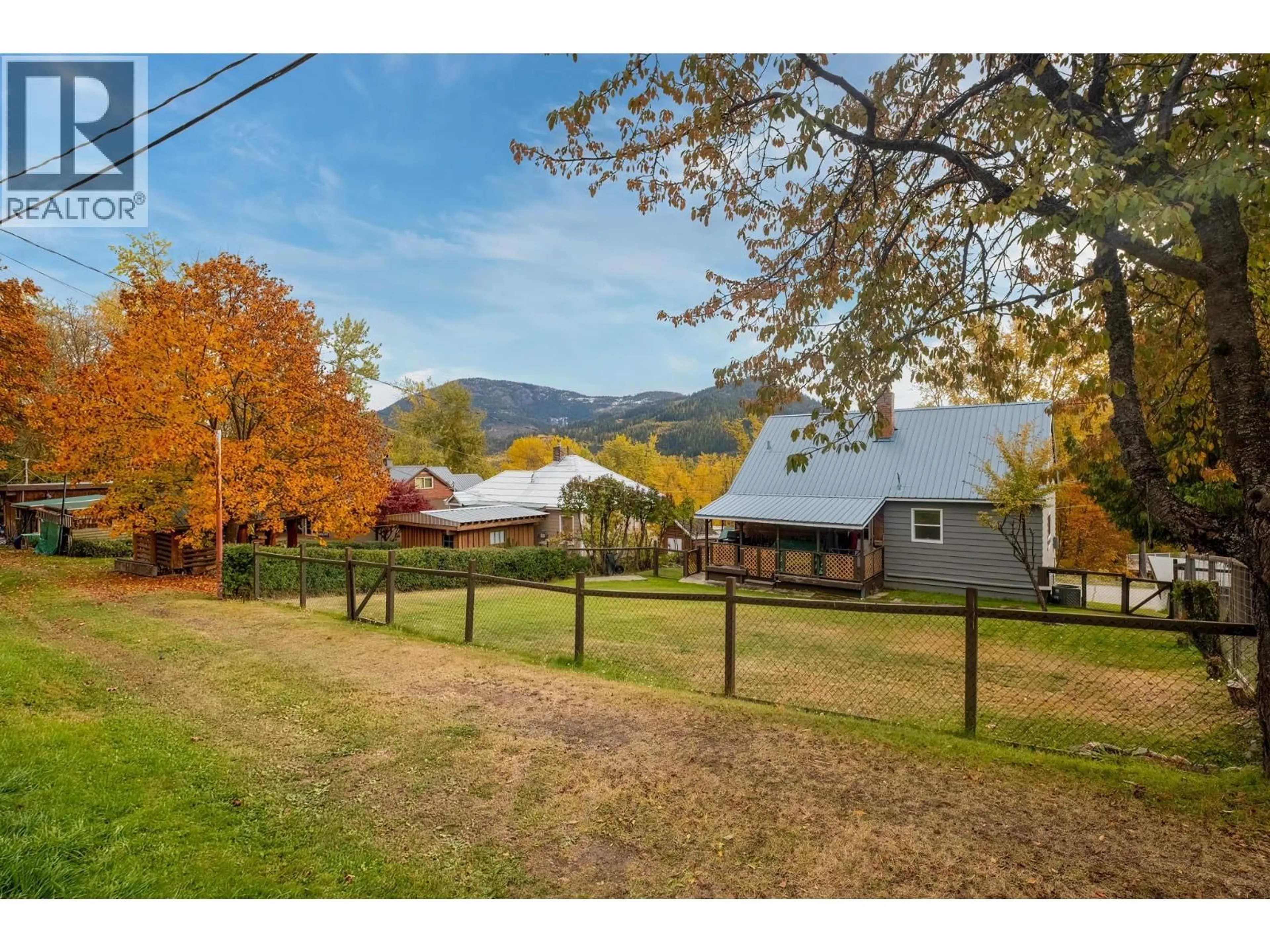 A pic from outside/outdoor area/front of a property/back of a property/a pic from drone, mountain view for 2130 VICTORIA AVENUE, Rossland British Columbia V0G1Y0