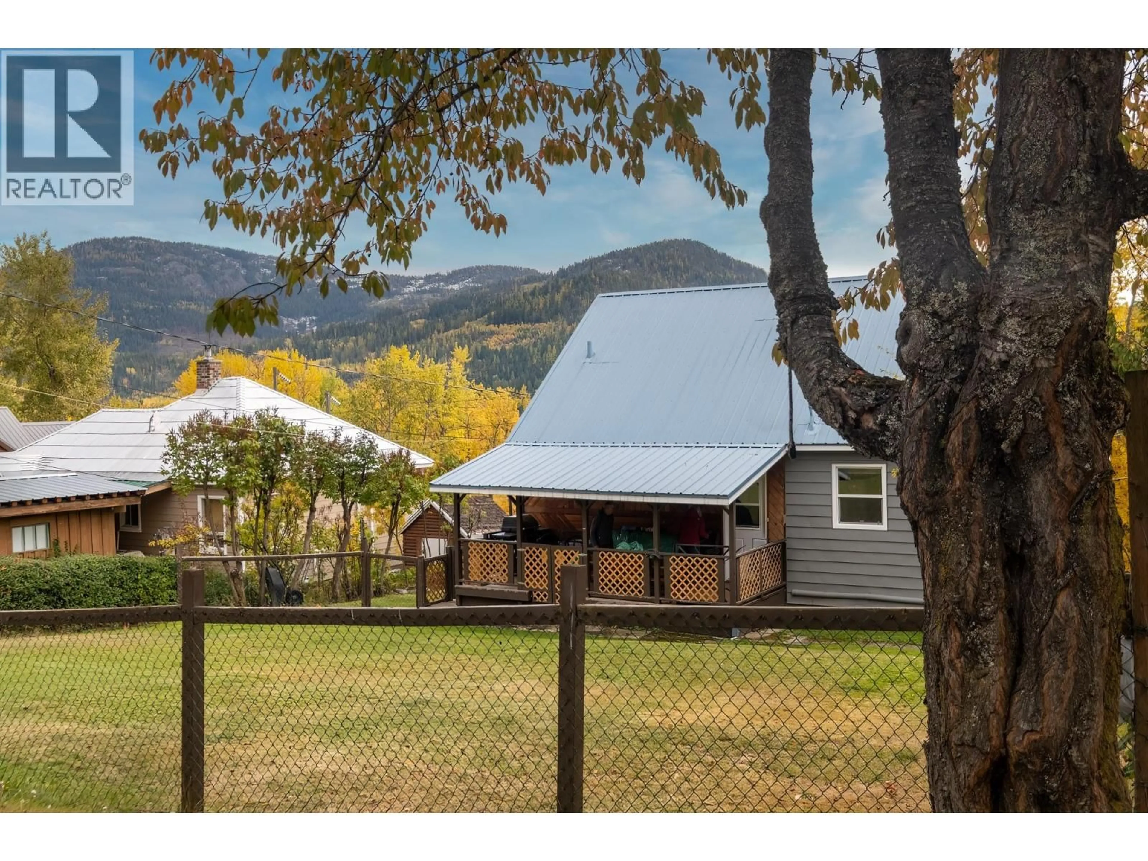 A pic from outside/outdoor area/front of a property/back of a property/a pic from drone, mountain view for 2130 VICTORIA AVENUE, Rossland British Columbia V0G1Y0